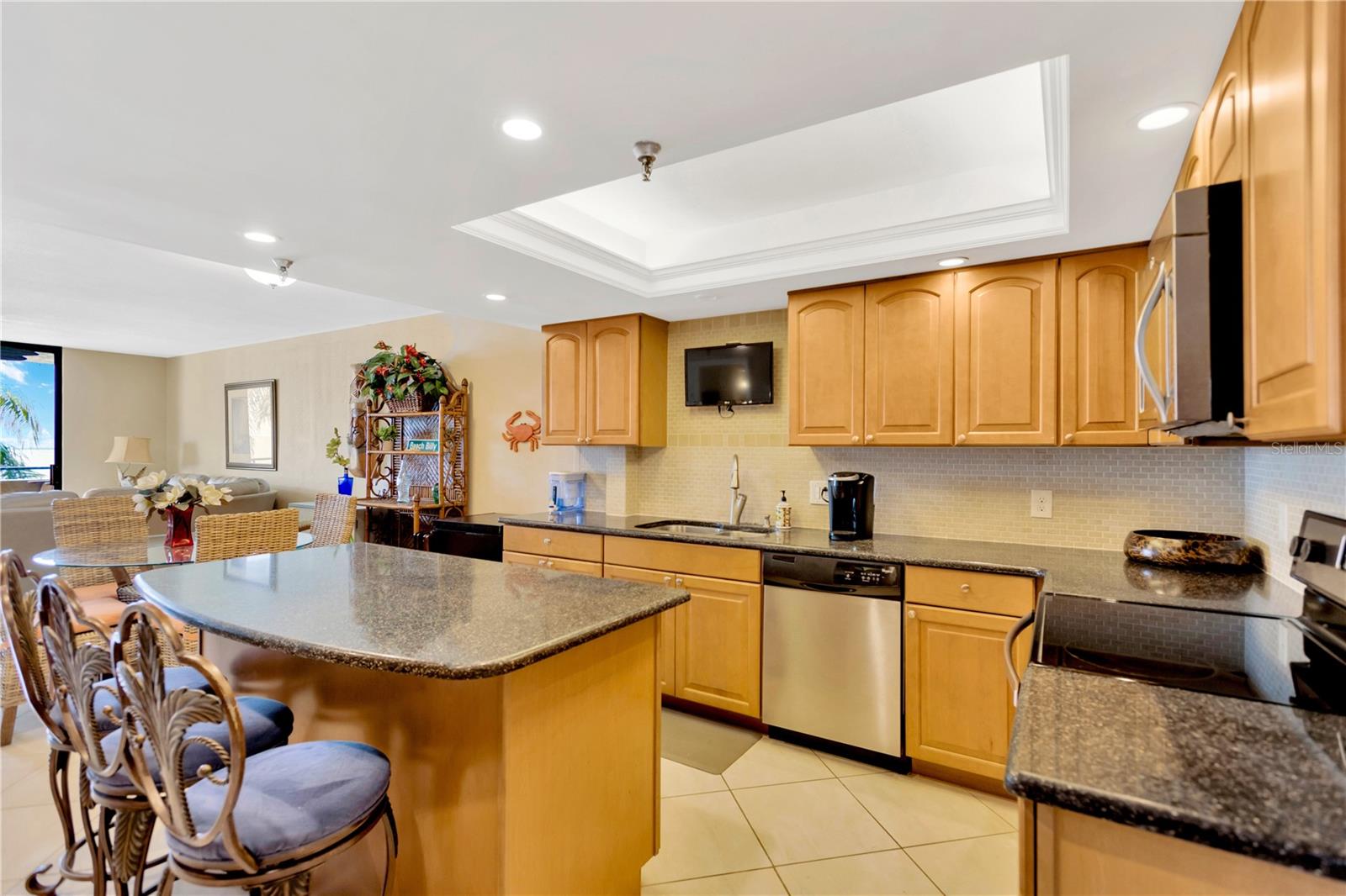 This state of art kitchen has everything including TV so you will never miss your favorite program.