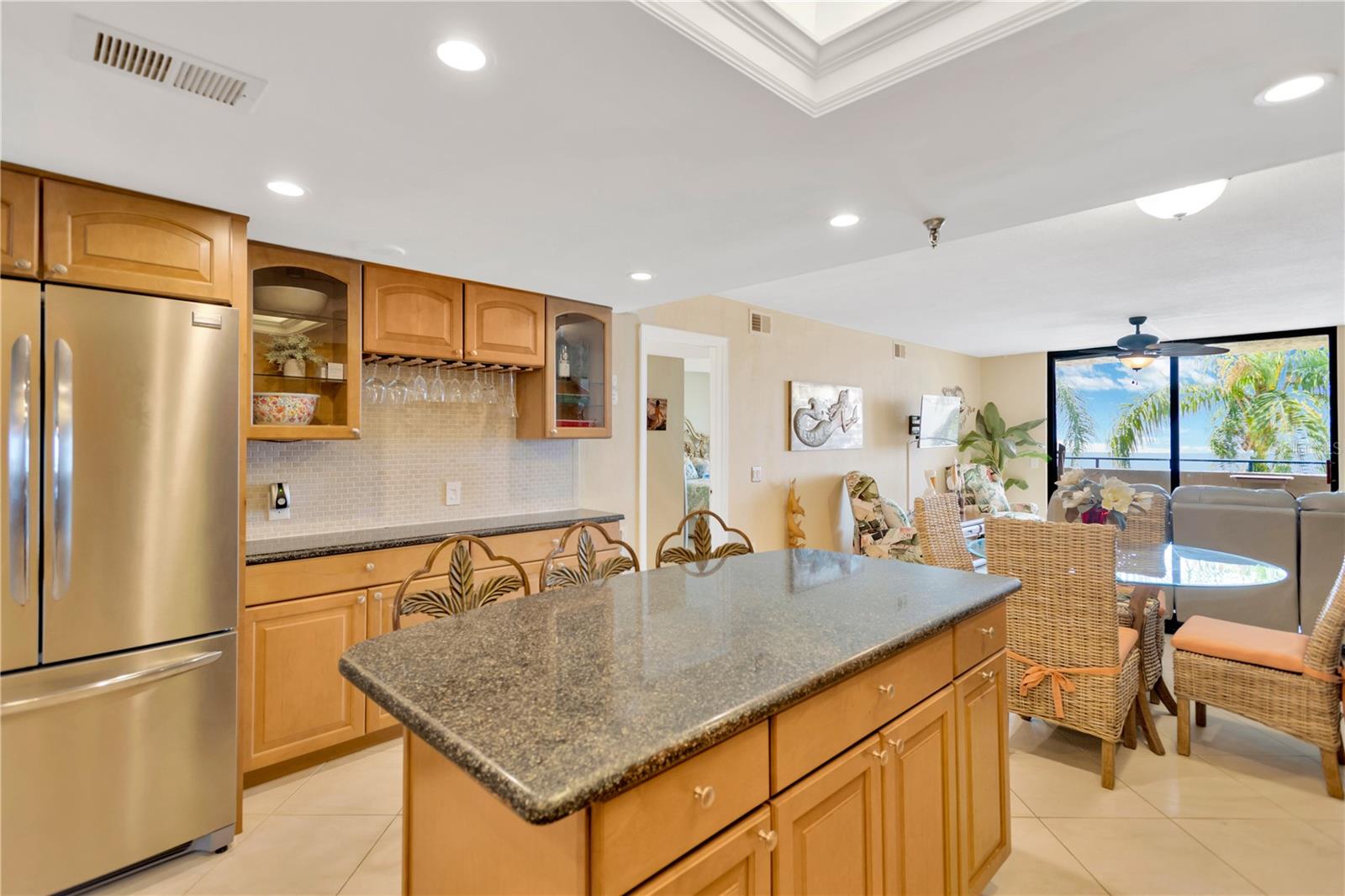 The kitchen has been said to be the "heart of the home".  Guests like to gather at the "island" and easy serving from your attractive built-in buffet.