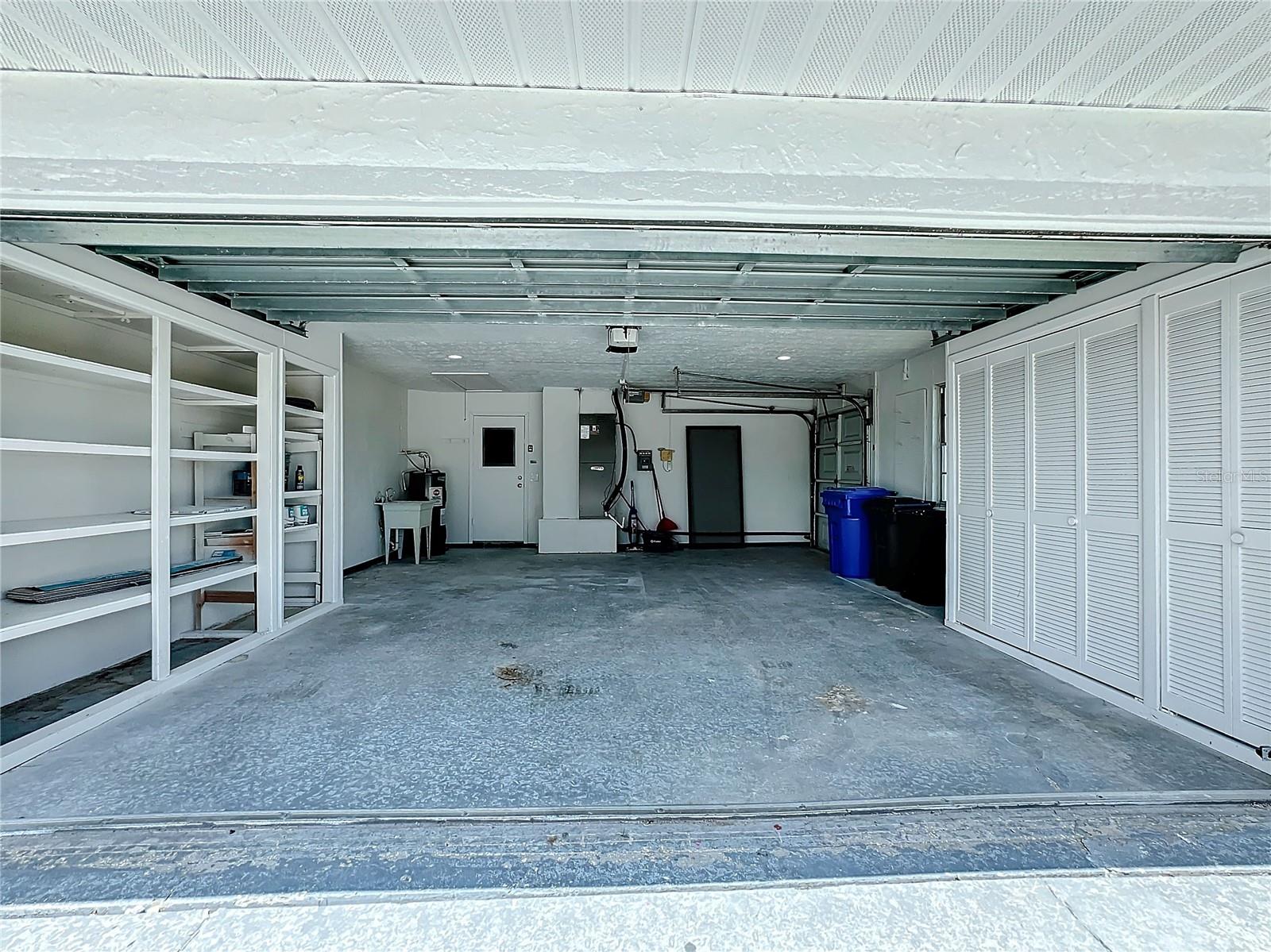 Garage with storage and golf cart entry