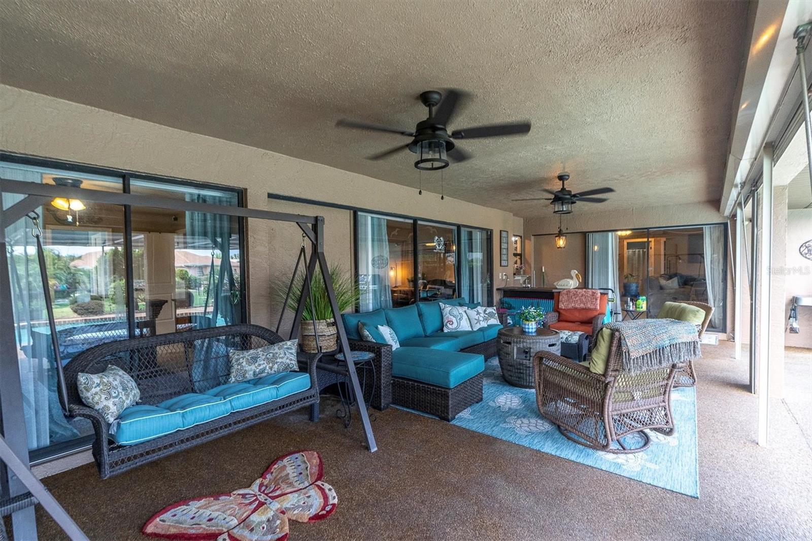 Covered patio with ceiling fans