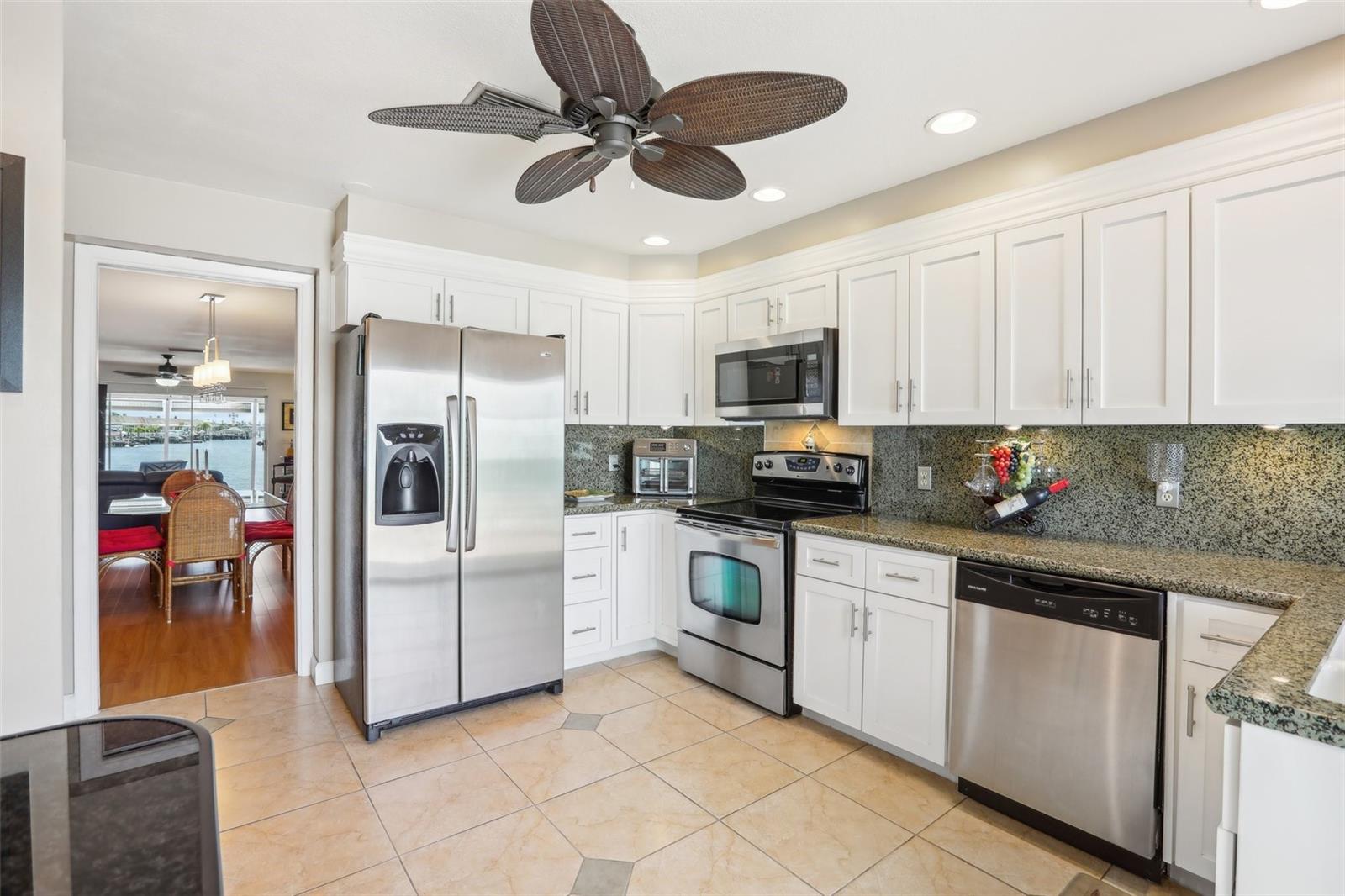 Kitchen view with door leading to Dining area