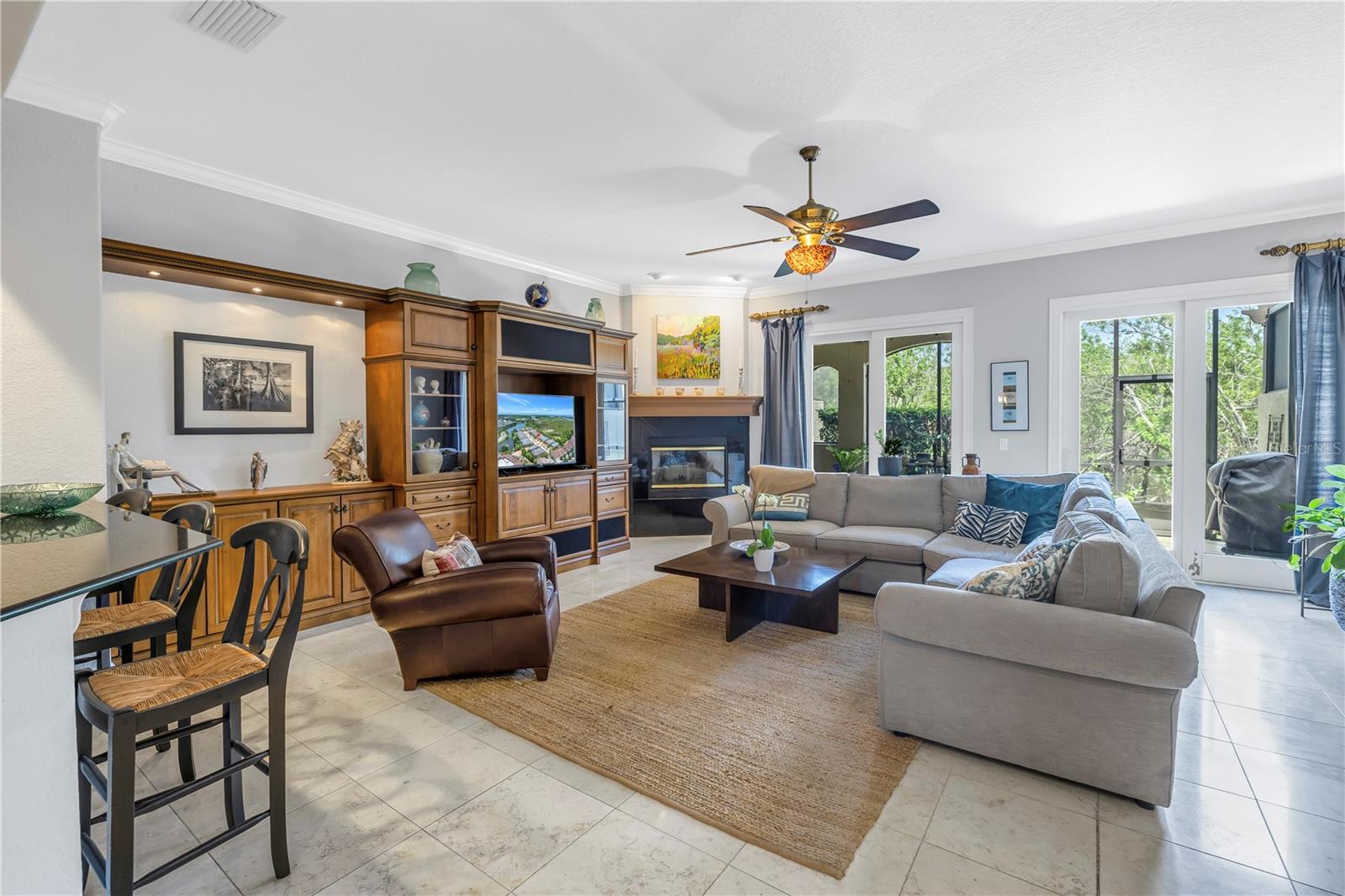 Living area with natural light from 2 sets of sliding doors