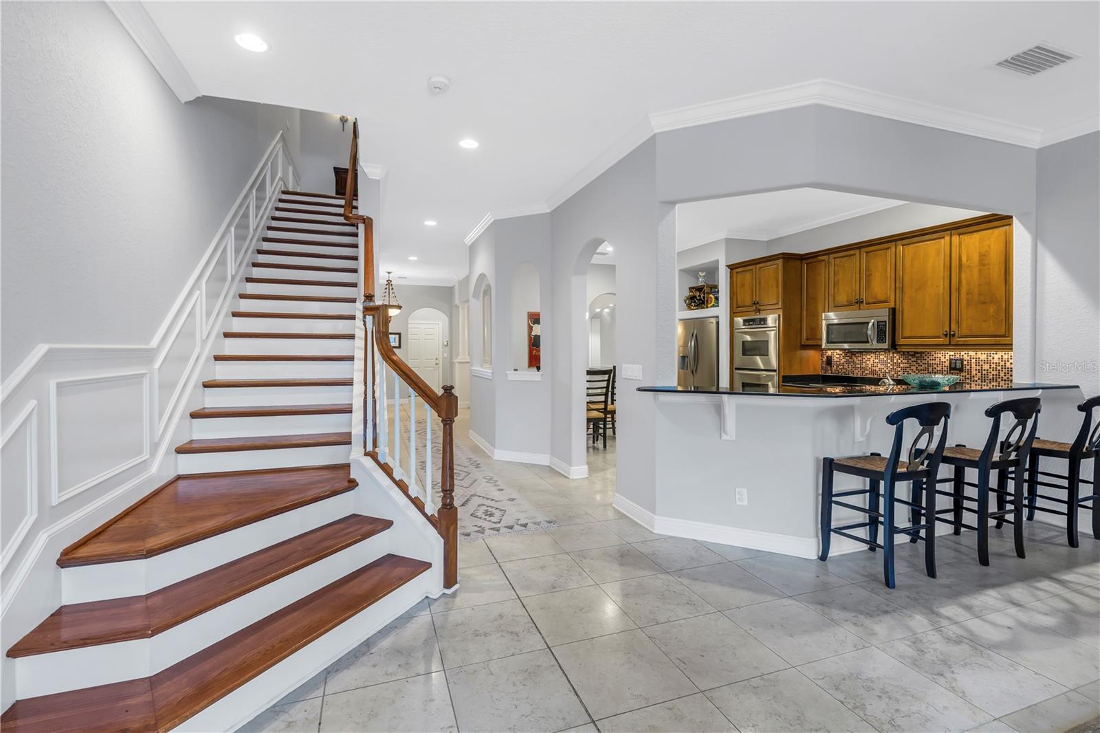 Breakfast area & stairs to 2nd level bedrooms