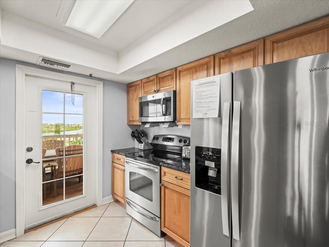 Kitchen with door to balcony