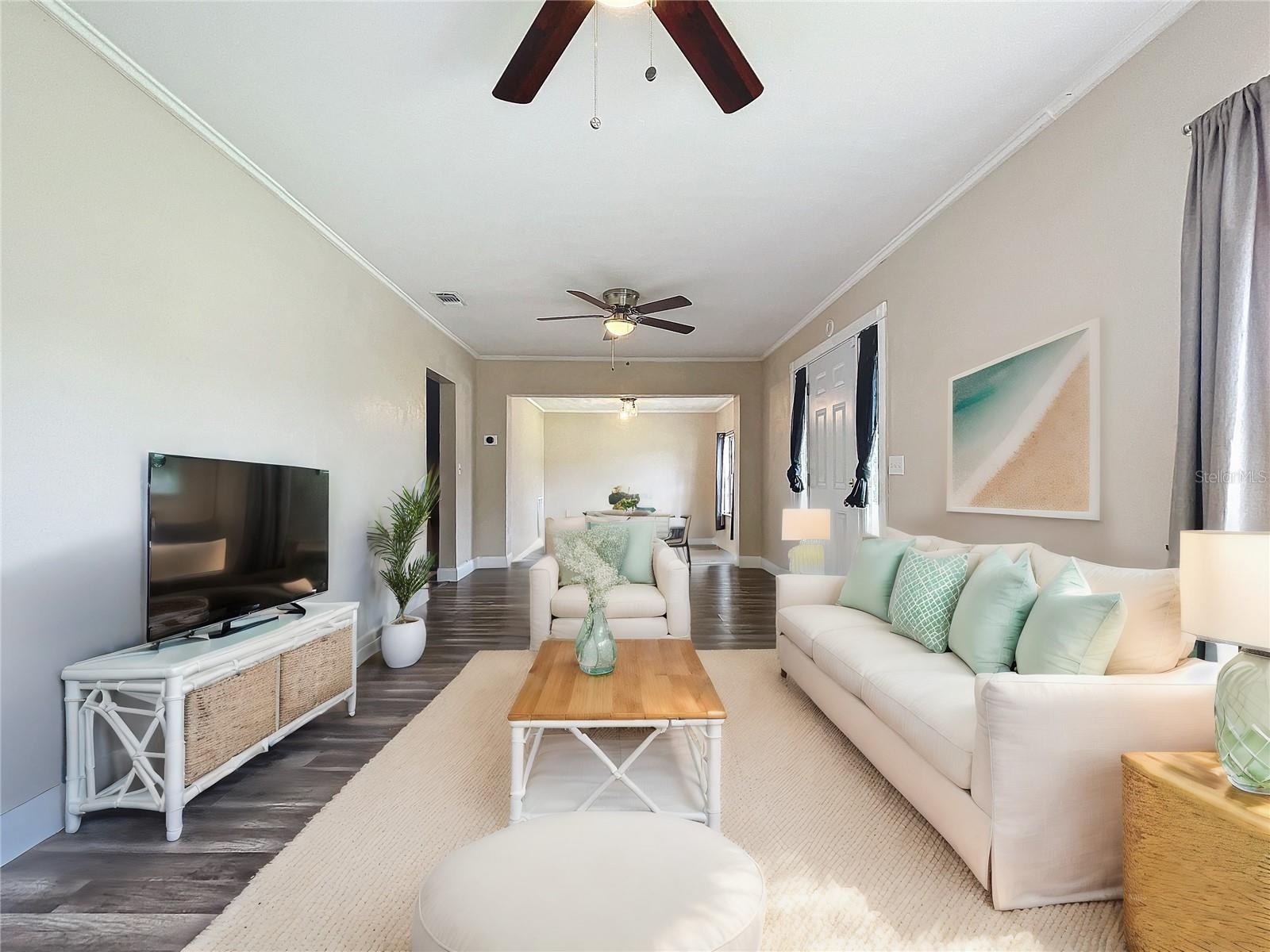 Living room looking towards dining-virtual staging