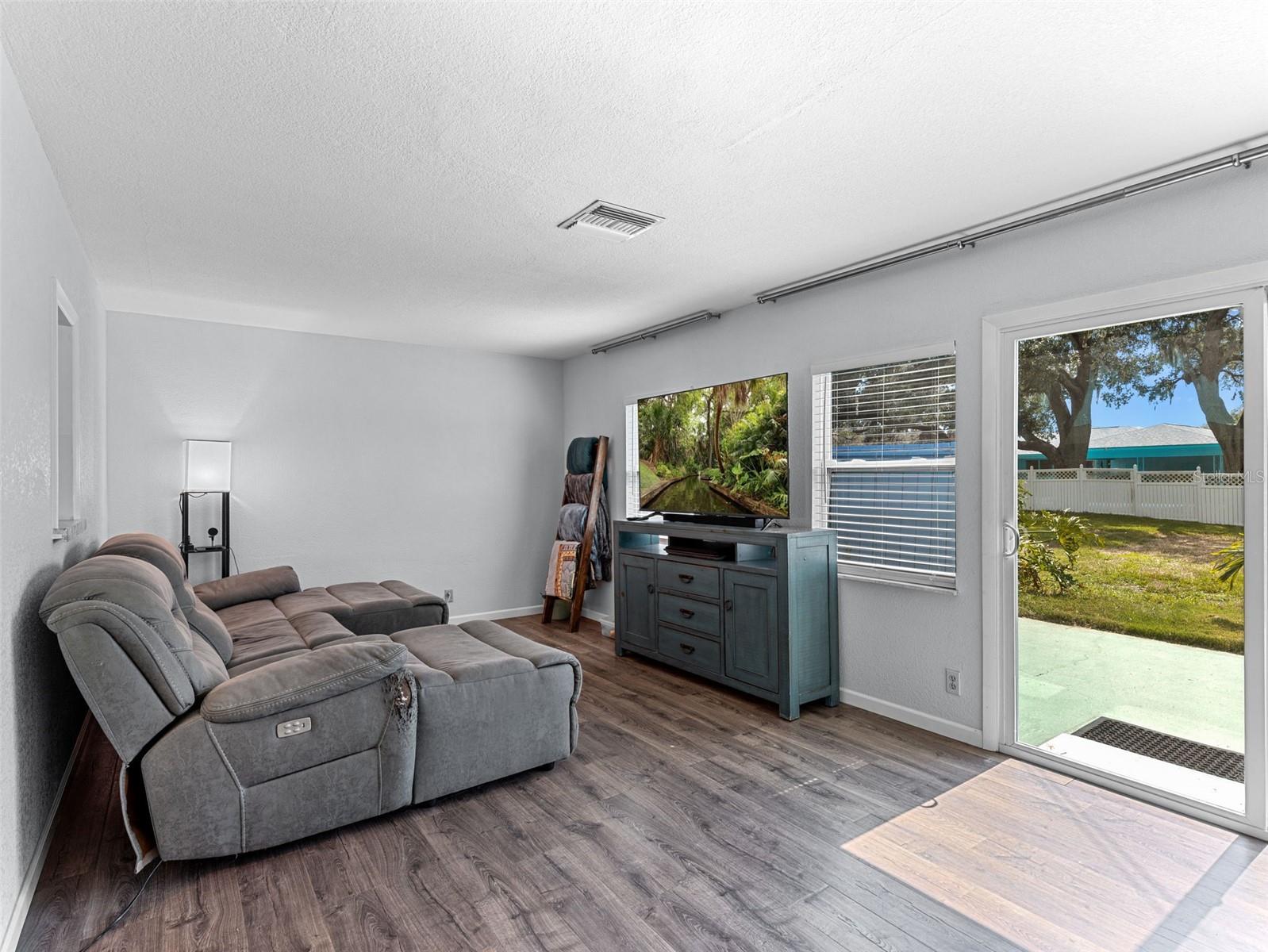 Sliding Doors lead out to side patio