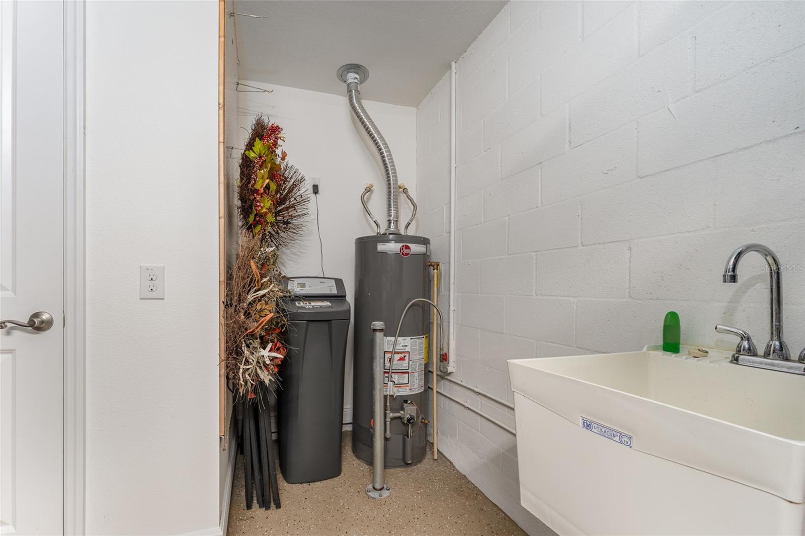 Water Softener, Gas Water Heater & Utility Sink in Back of 3rd Garage Bay