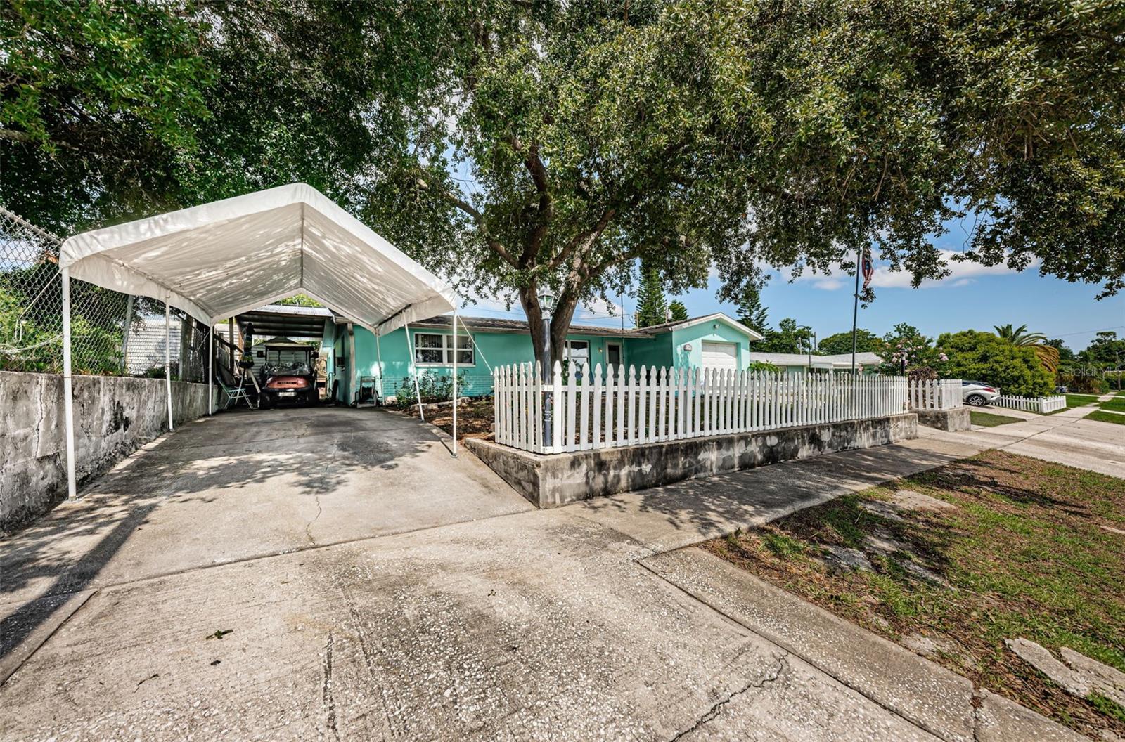 Second driveway with carport