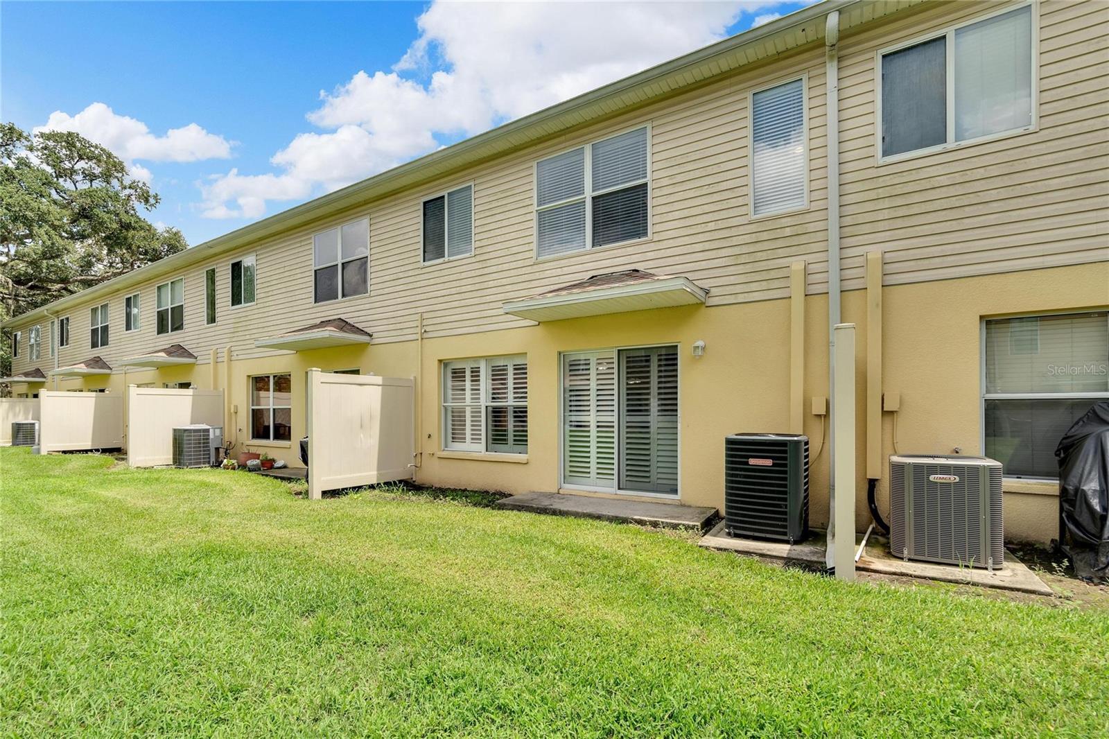 Back of Townhouse View with California Shutters