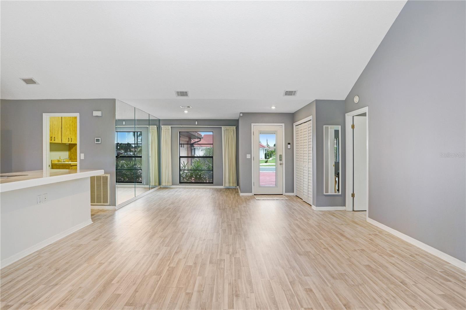 Great Room looking at dining room and front door