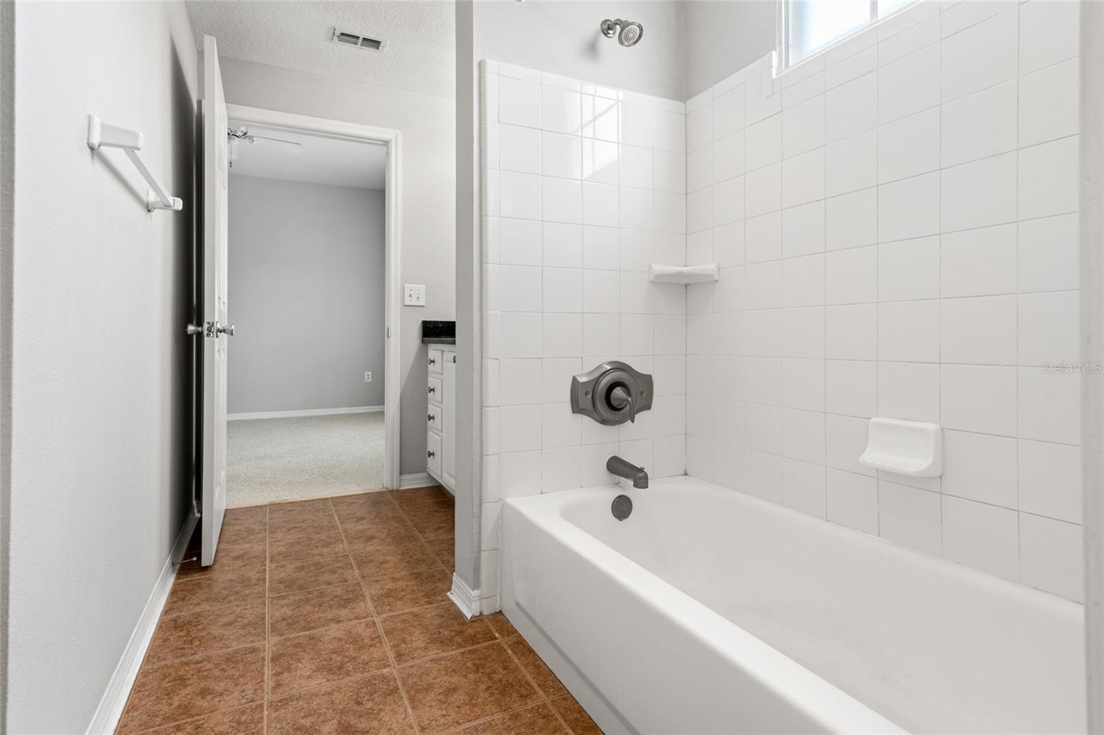 Primary Bedroom ensuite with walk-in closet