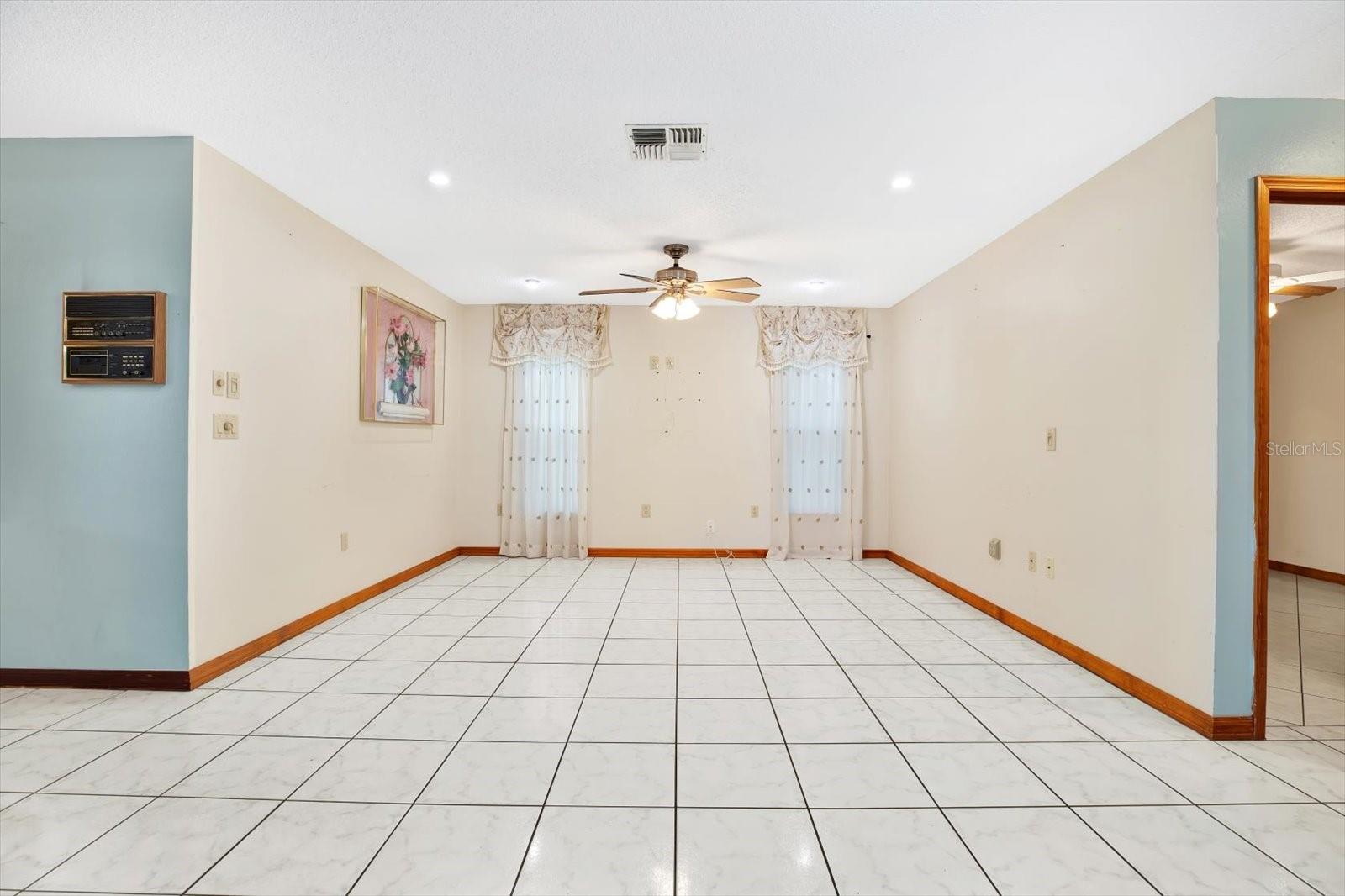 Family Room with Accent windows that could frame a fireplace or Entertainment center