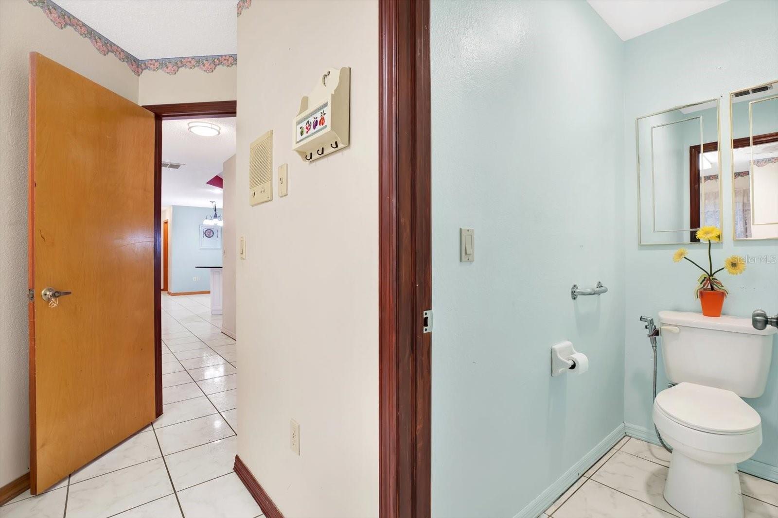 A quarter bath off the laundry room adjacent to the Garage