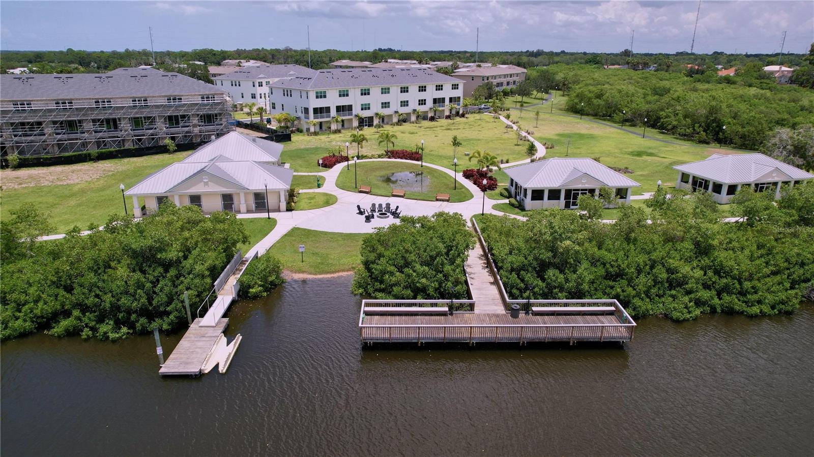 Waterfront community with kayak launch and fishing dock.