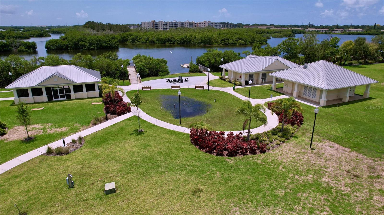 Screened pavilions provide additional entertaining space for large gatherings.