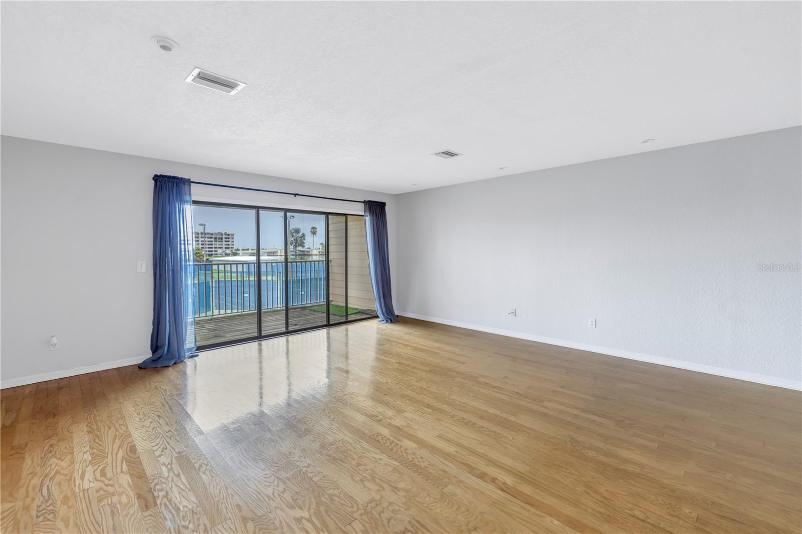 Hardwood floors in great room.