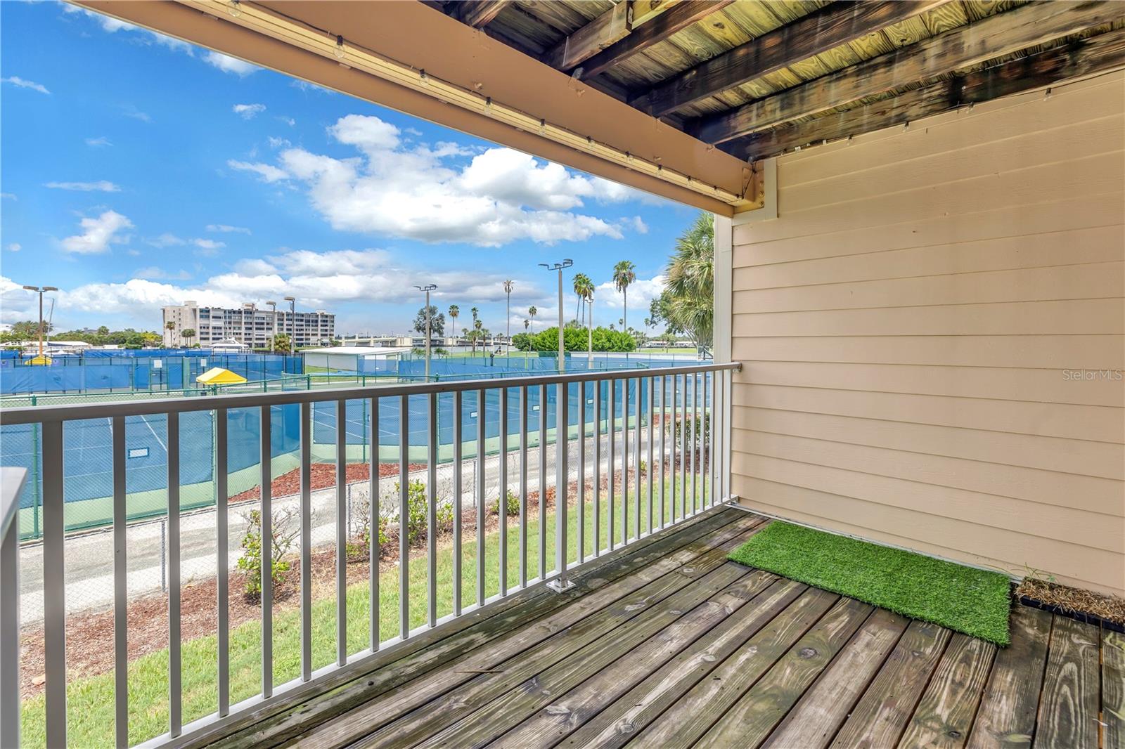 Deck overlooks the Treasure Island Causeway Bridge and.