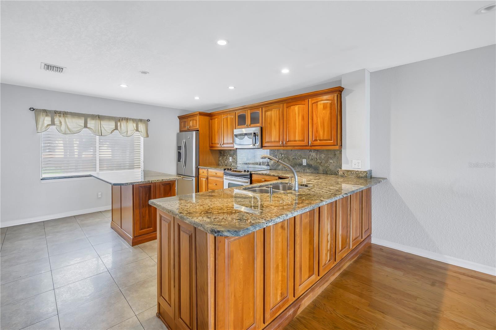 Bar and island for entertaining.