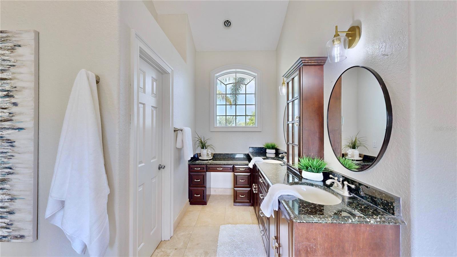 Dual sink and dual vanity. Separate toilet.