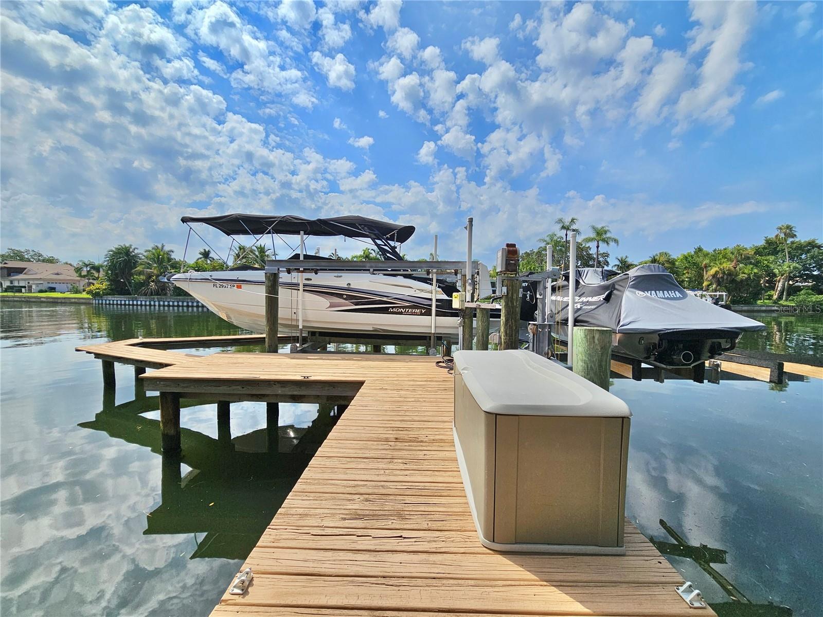 Dock with boat lift & jet ski lift.