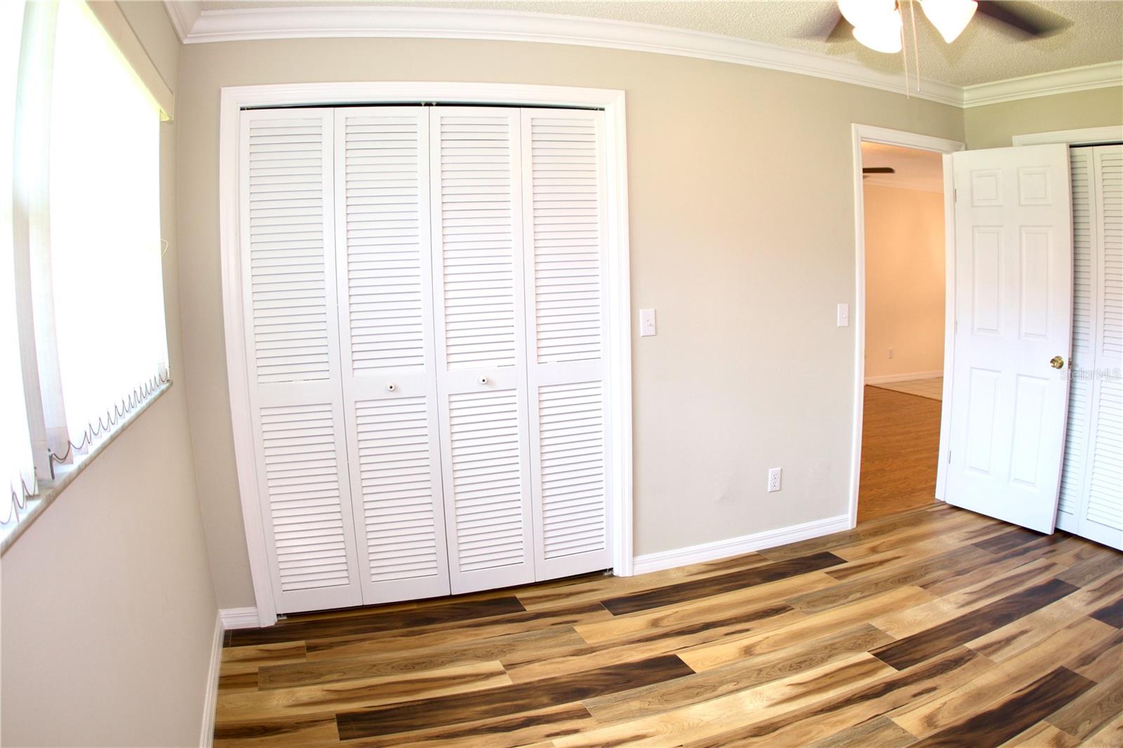 Primary Bedroom Door and Closet 1