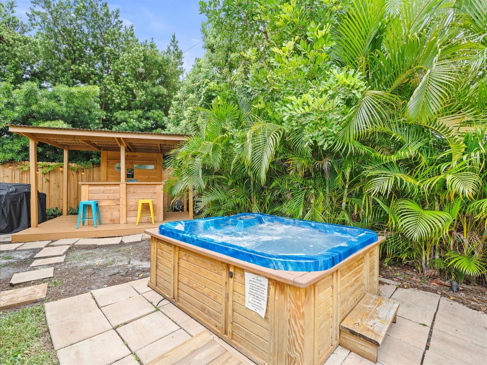 Hot tub and custom tiki Bar