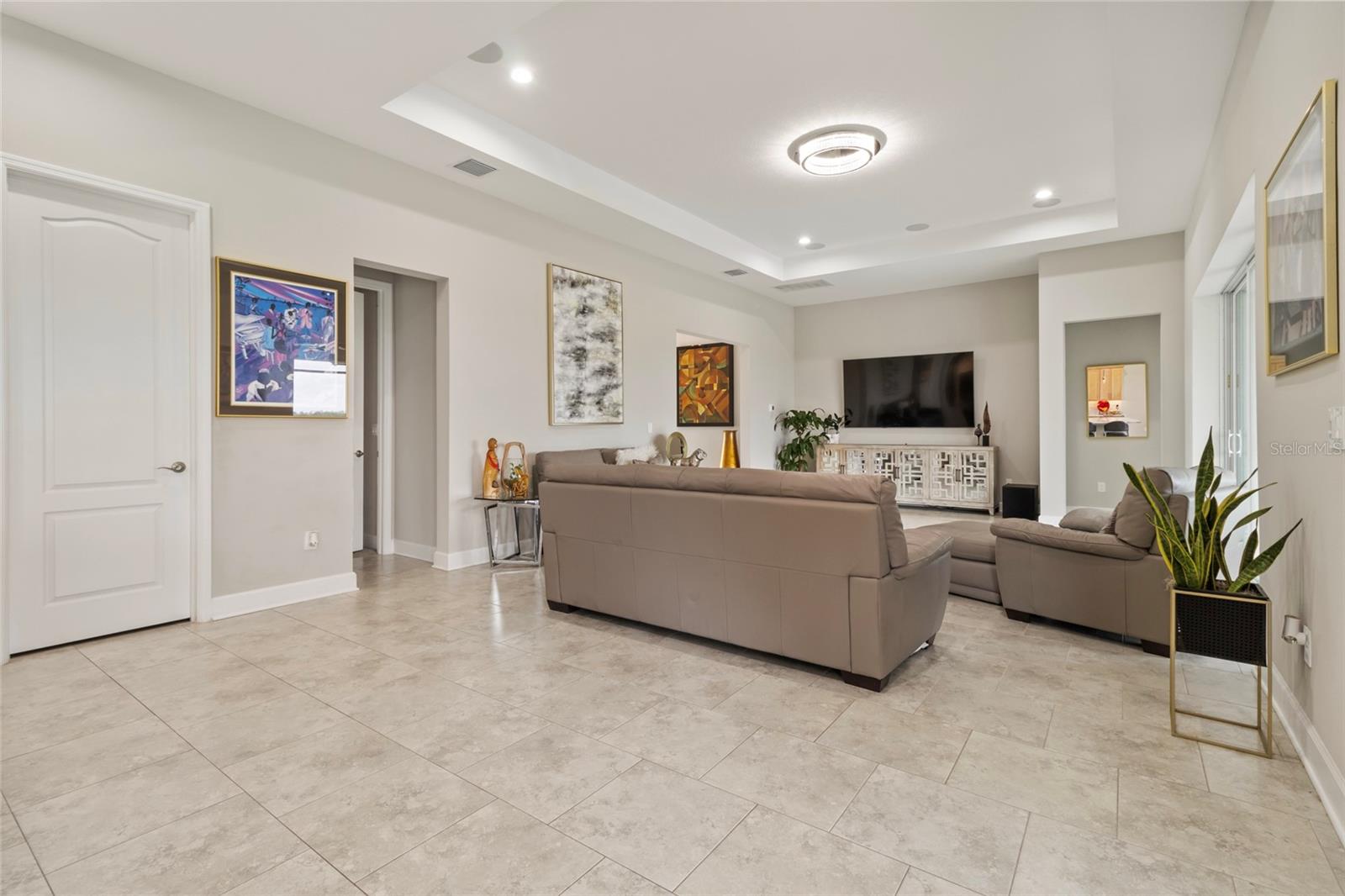 Hallway to the left leads to 3rd bedroom. Thoughtful floor plan. No shared bedroom walls.