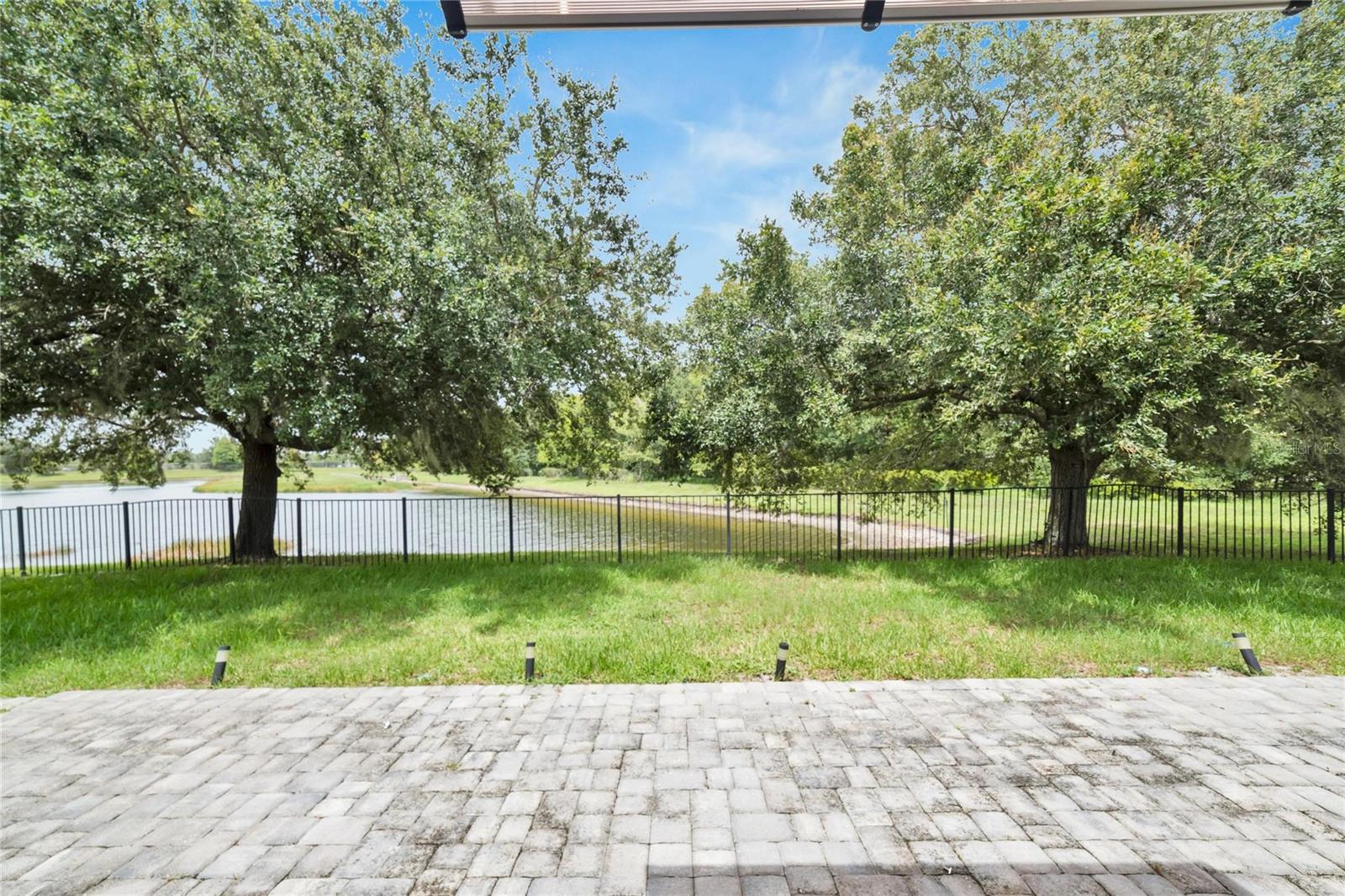 Patio view of backyard and pond view