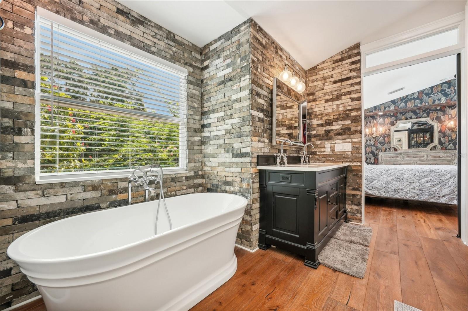 Master bath with view into Master Bedroom