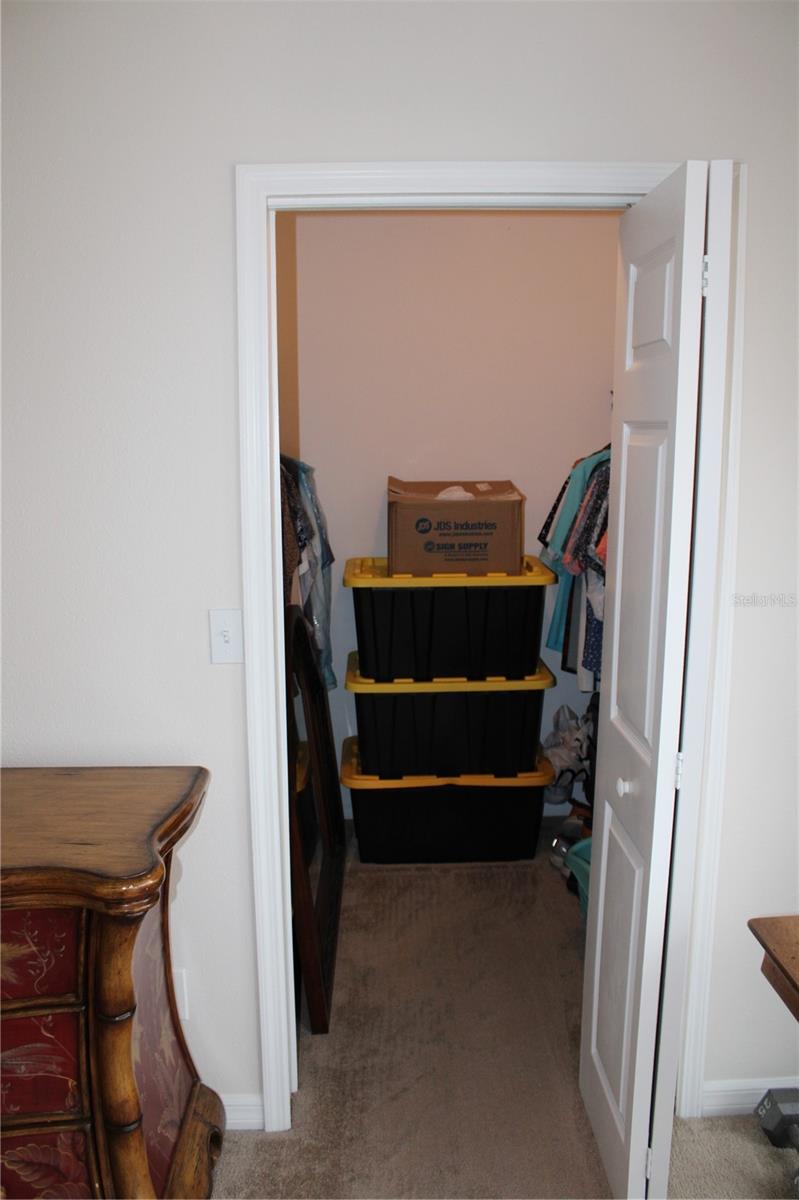 one of two closets in master bedroom