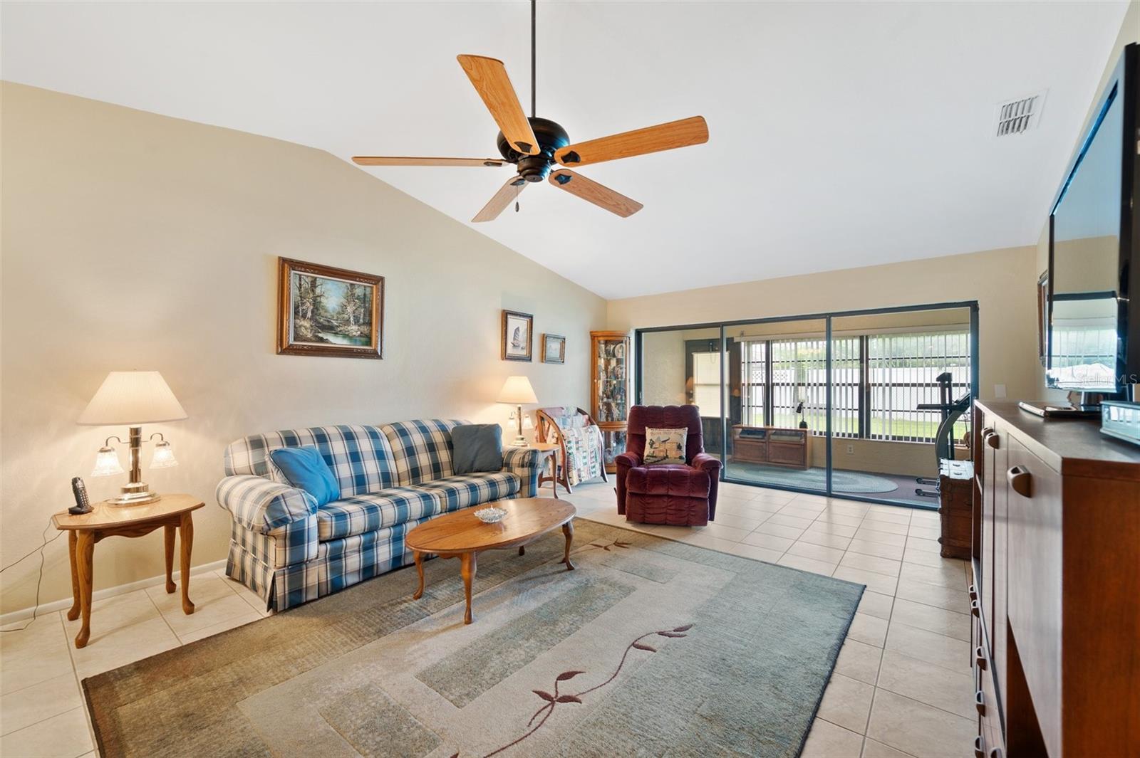 Living room with sliding doors to the Florida room