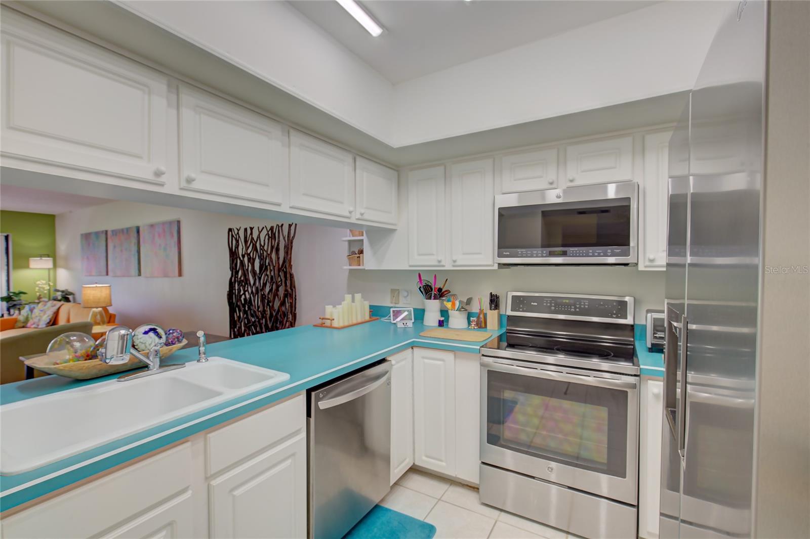 Kitchen with stainless steel appliances.