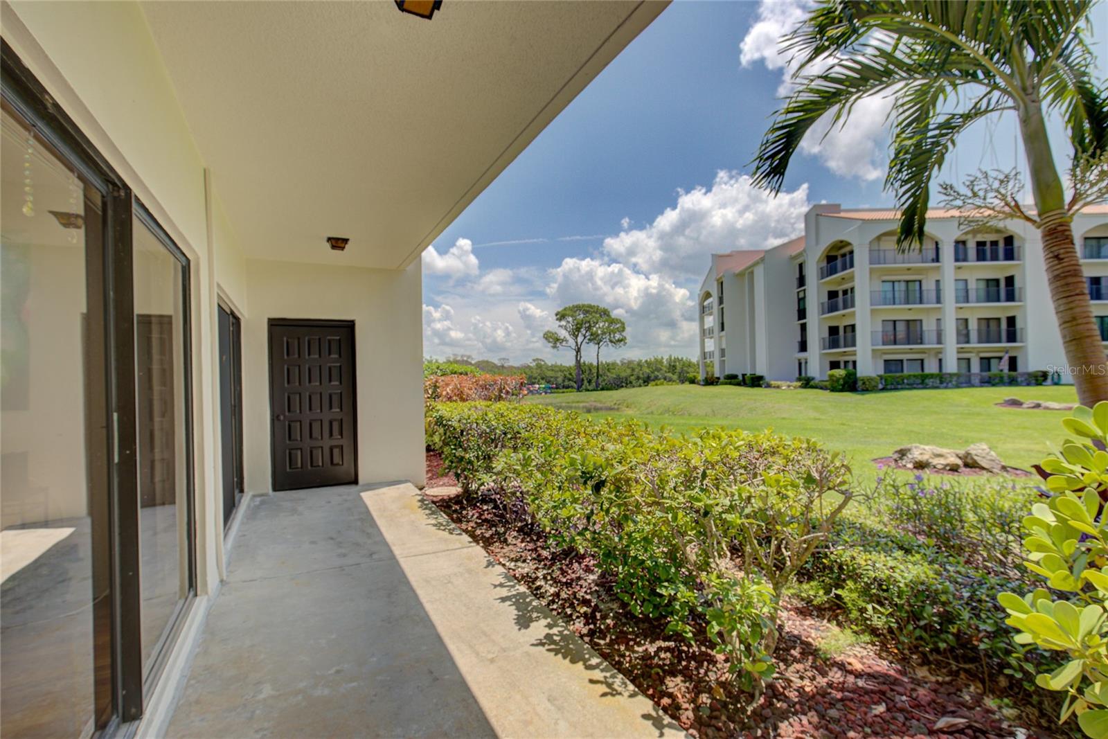 Patio with sliding doors to access from living room and bedroom.