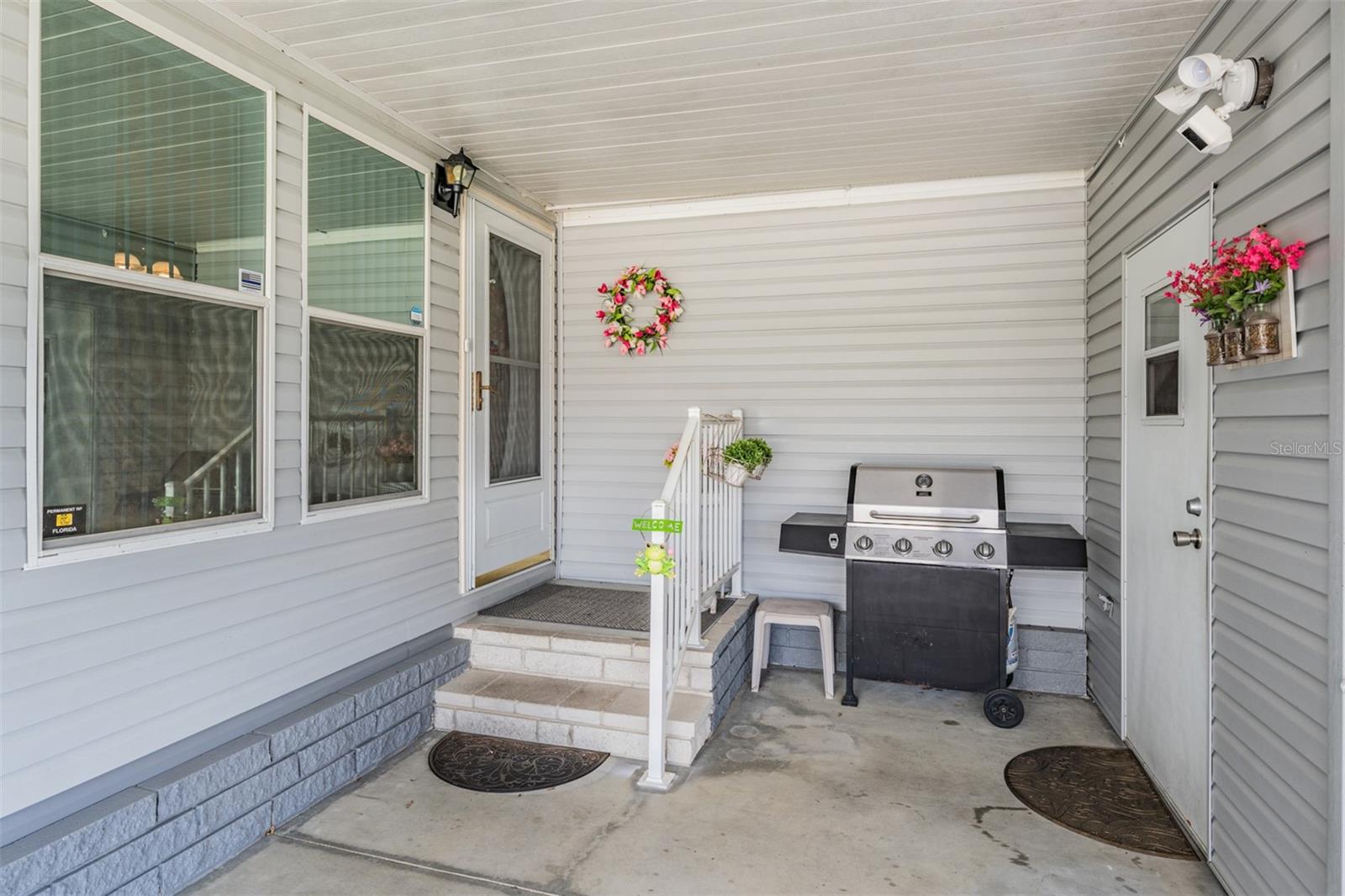 Attached shed and covered entry