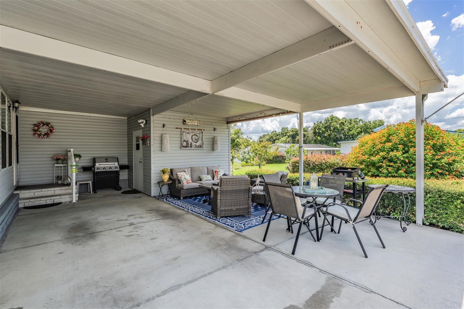 Visit with neighbors with a view of the next door gazebo & butterfly garden