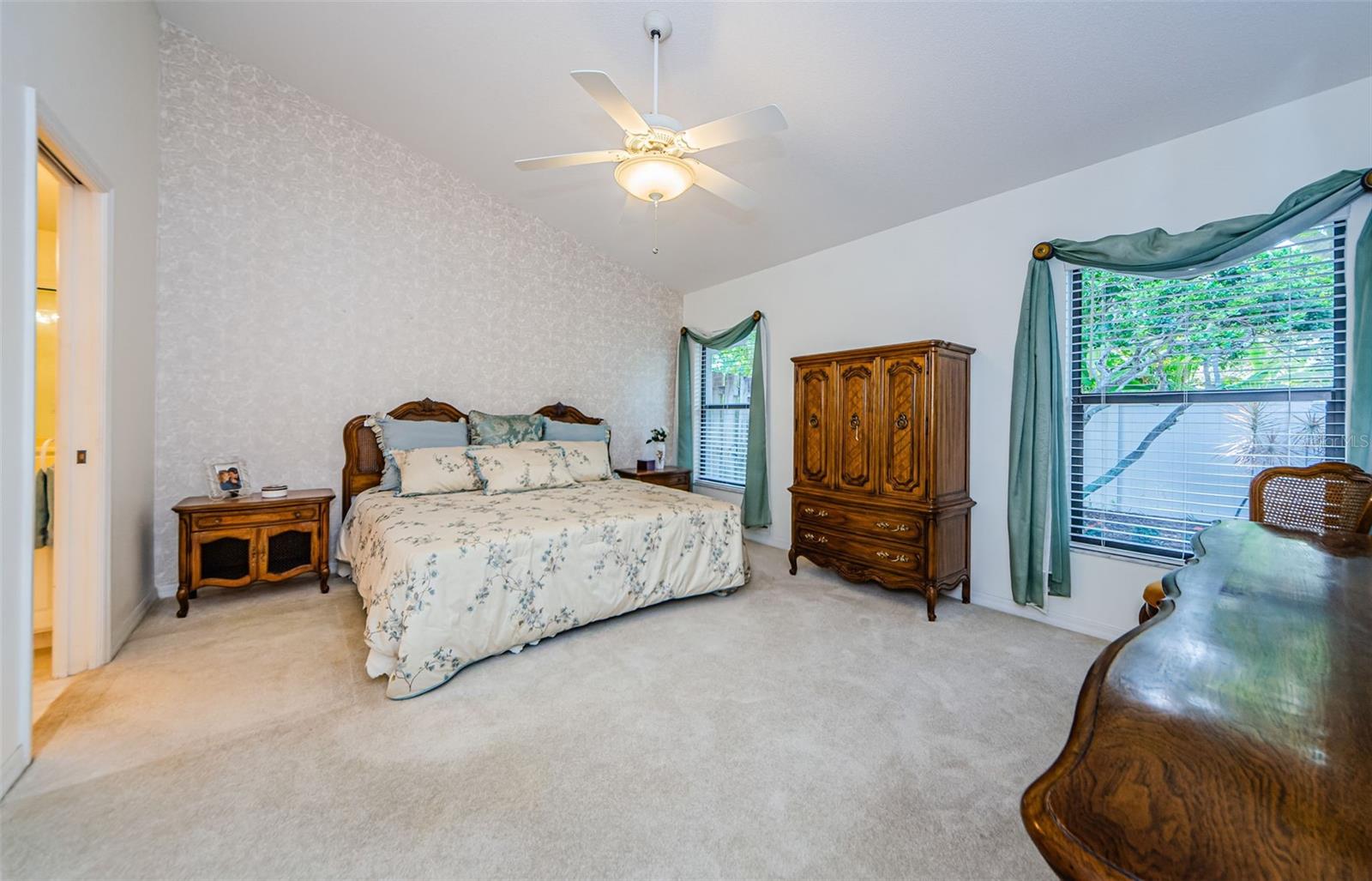 The master bedroom holds a king sized bed and dressers easily! Ensuite bath and walk in closet as well!