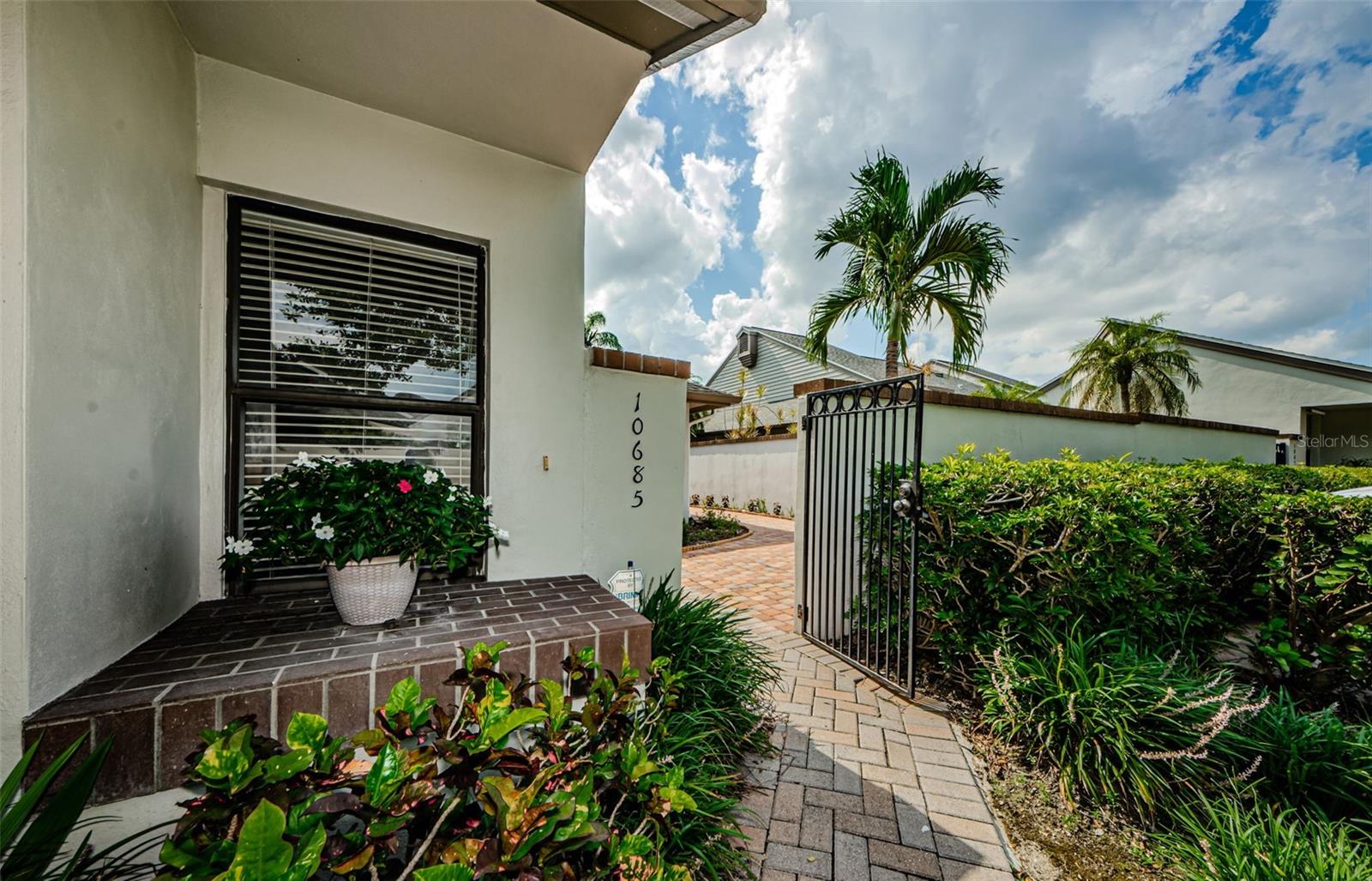 Your courtyard entry gate to 10685 Andrew Lane!