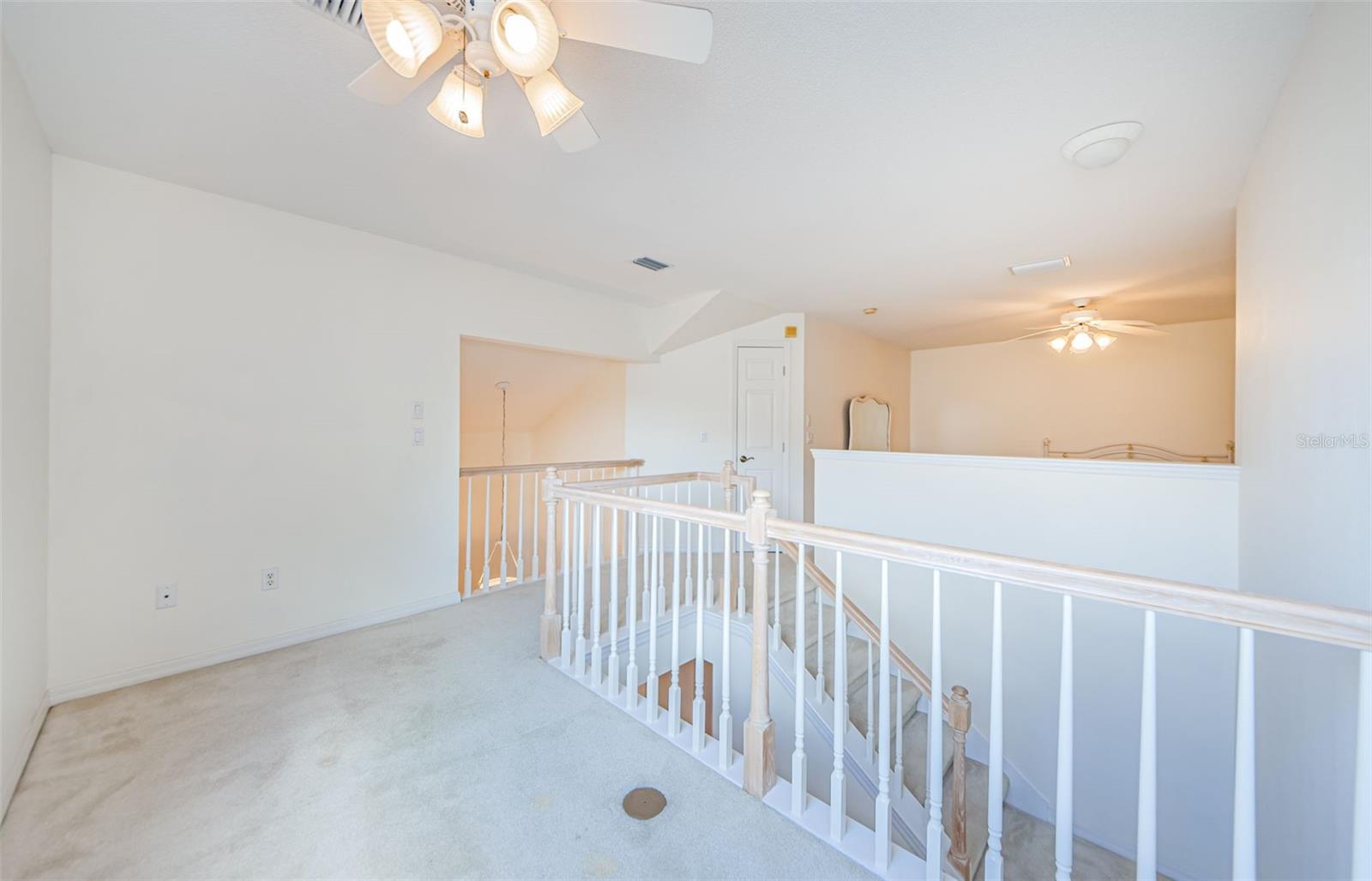 Another view of the office or sitting area upstairs. It's also open to the foyer (unless you want to wall it off...).