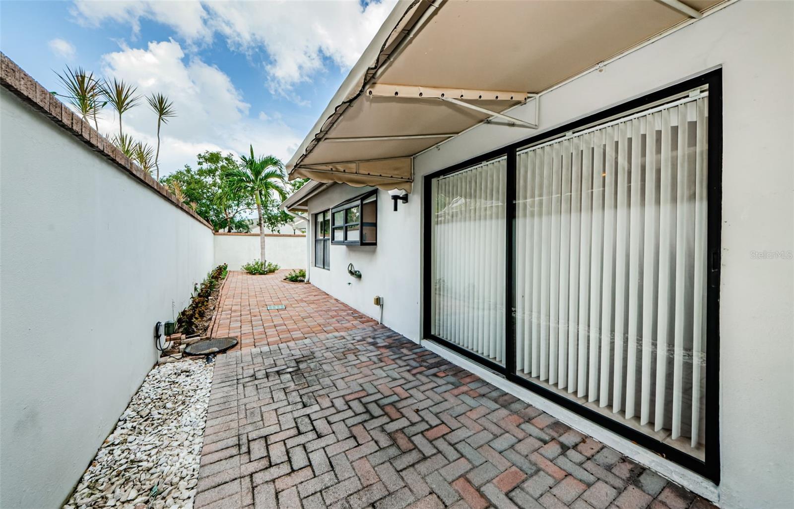 Your Courtyard walkway adjacent to the dining room sliding door...