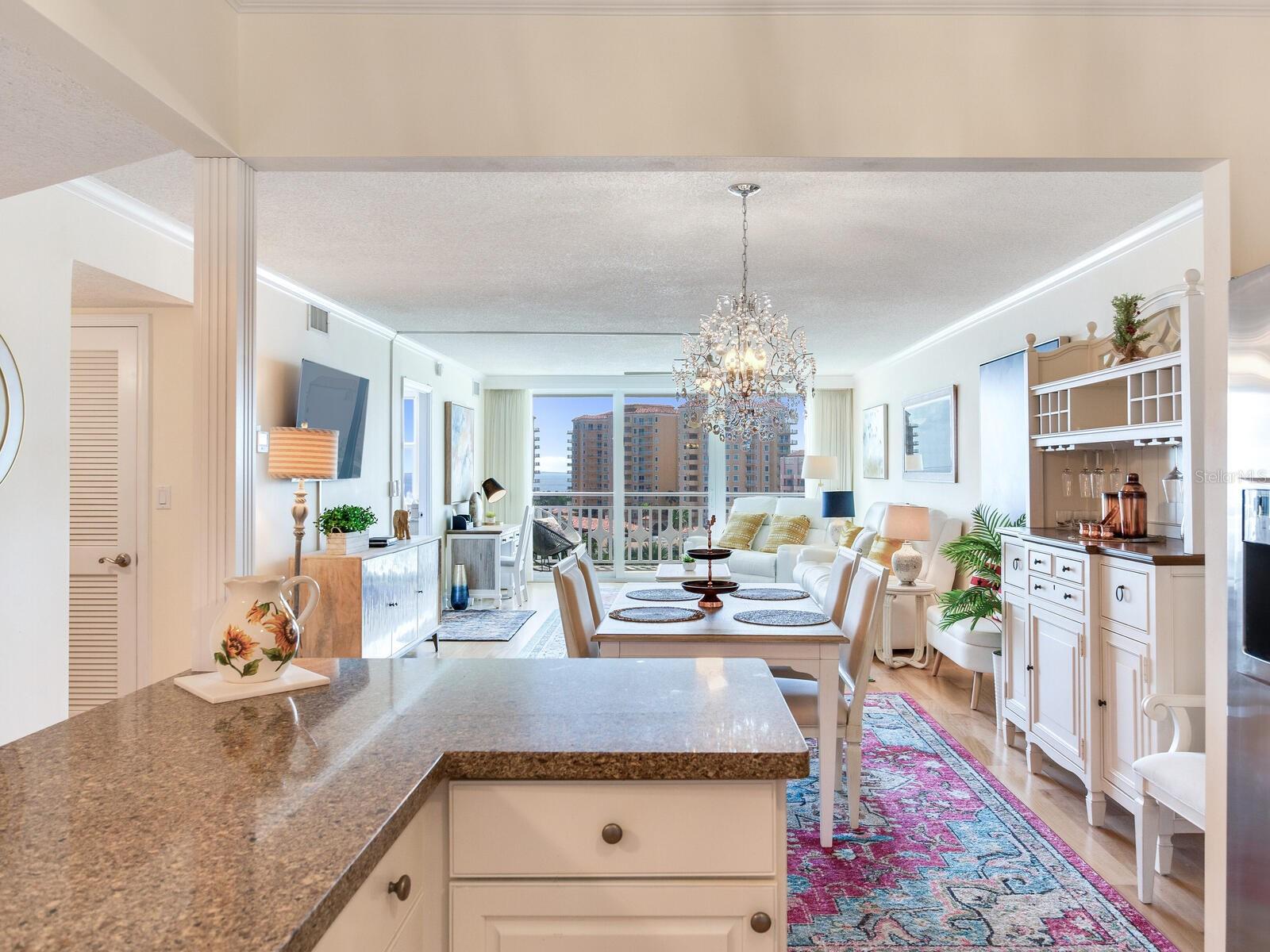 Kitchen view to Dining & Living Area