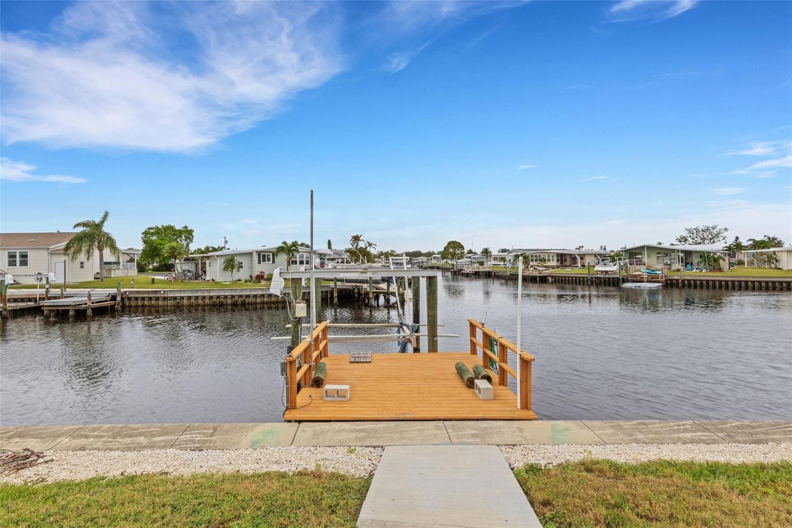 Dock & boat lift - can hold a 26' pontoon.