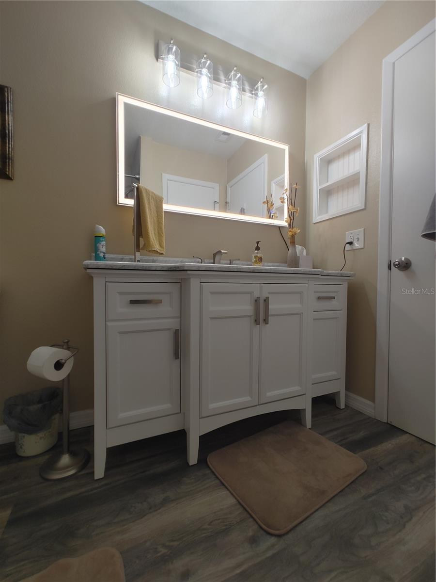 Awesome spaces in the 2nd bath the mirror adjust the lighting based on your needs.