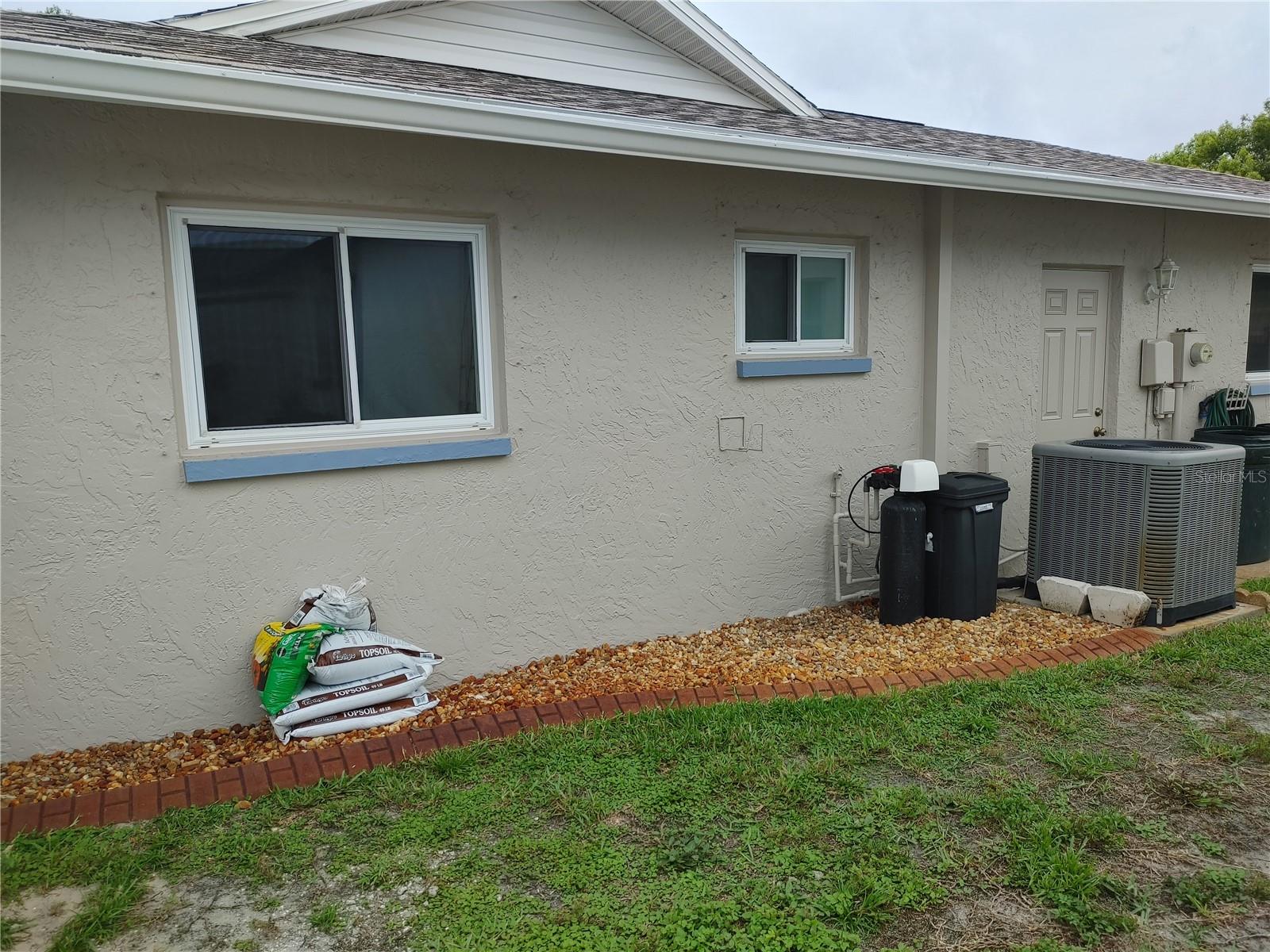 West side of house with curb appeal