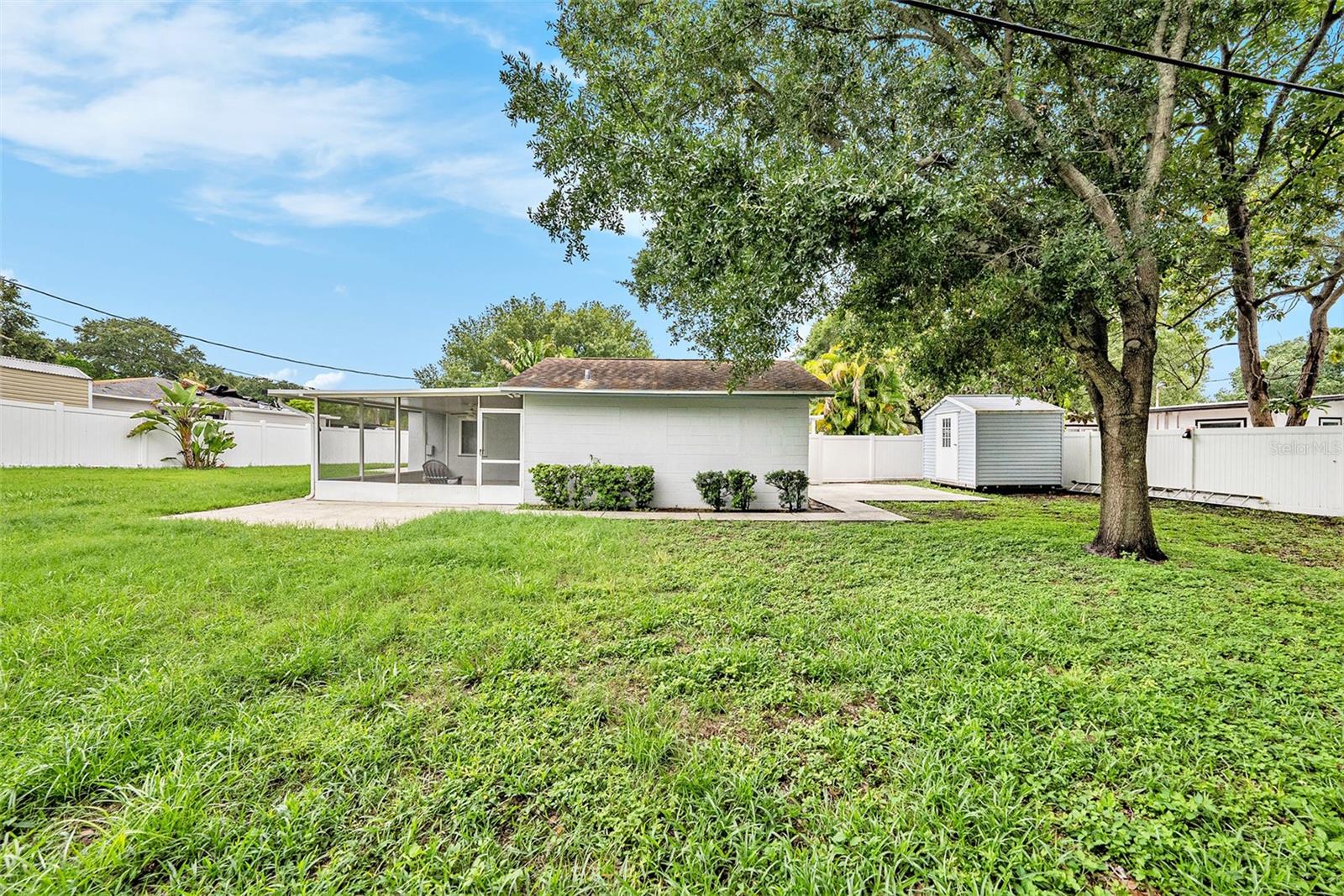 Huge fenced backyard with plenty of room for a pool!