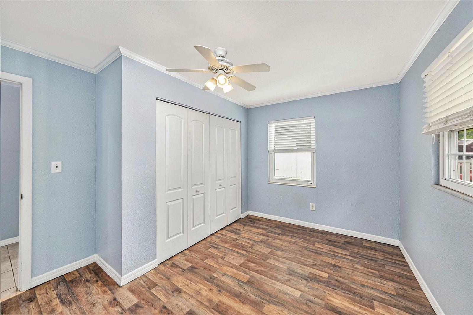 Bedroom 3 with ceiling fan.