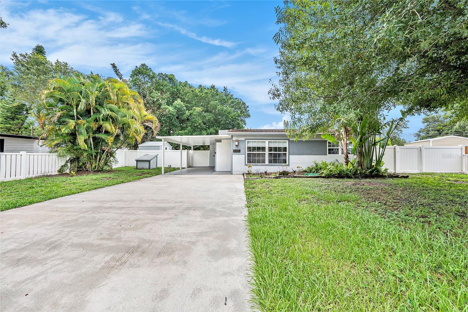 Large driveway with plenty of space for friends, family, and boat or RV.