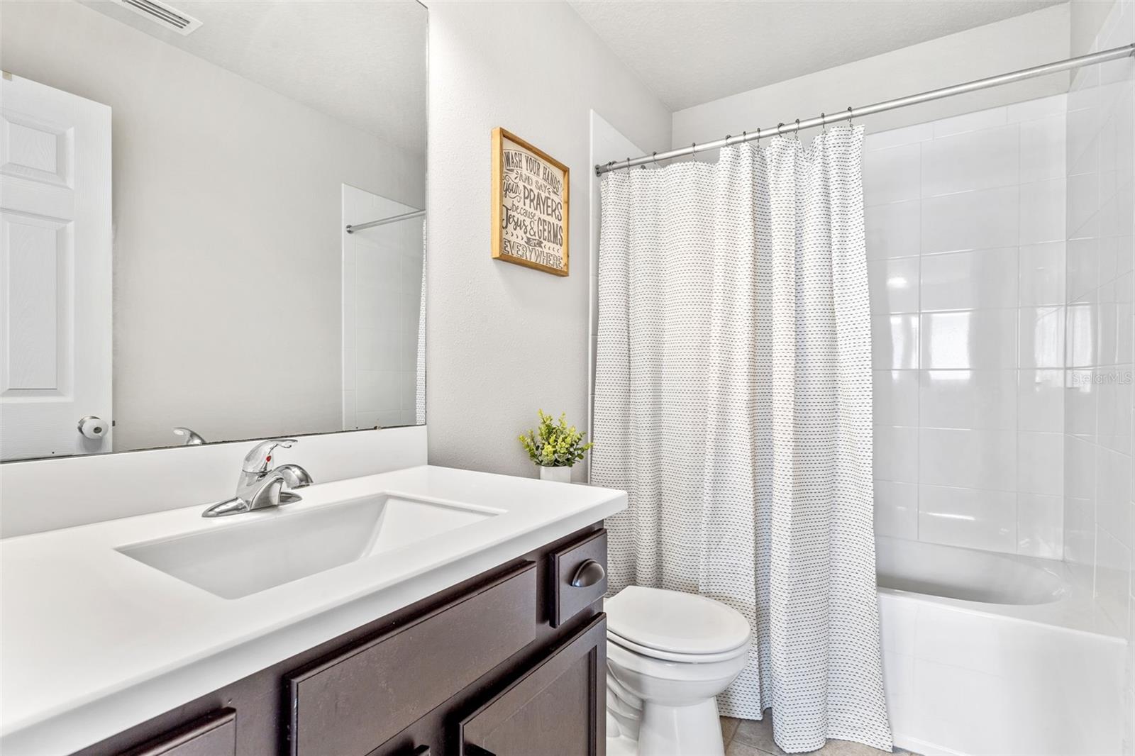 Upstairs bathroom with tub/shower combo