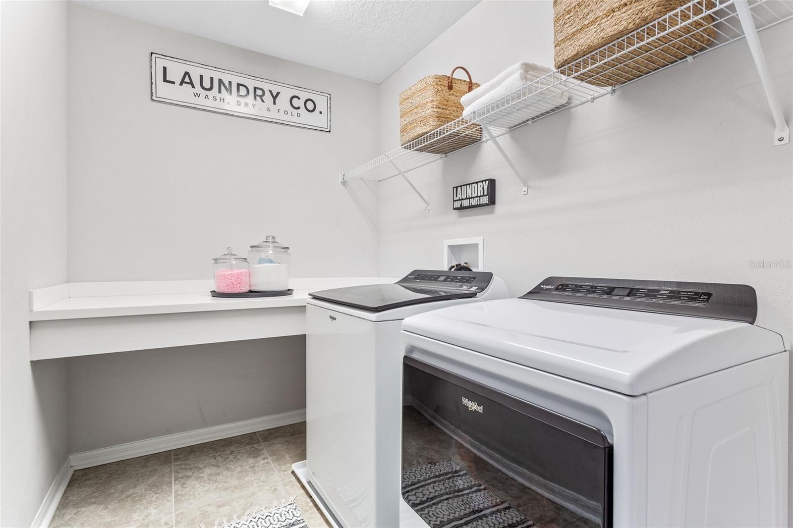 Laundry room with folding station.