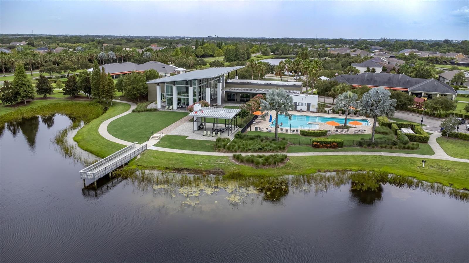 Clubhouse, fitness center and pool at Waterset entry