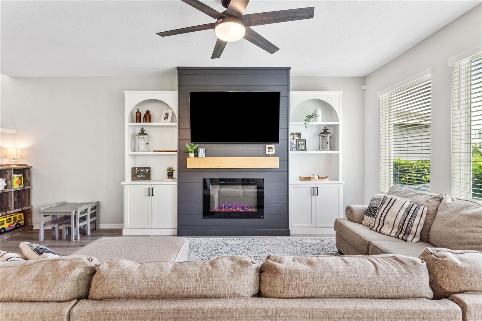 Living room featuring decorative fireplace